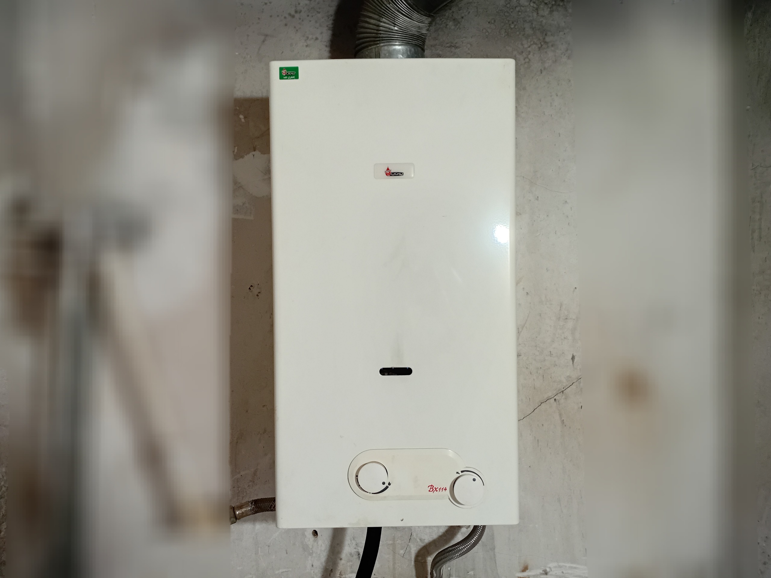 آبگرمکن گازی بوتان BX114 سالم تازه سرویس