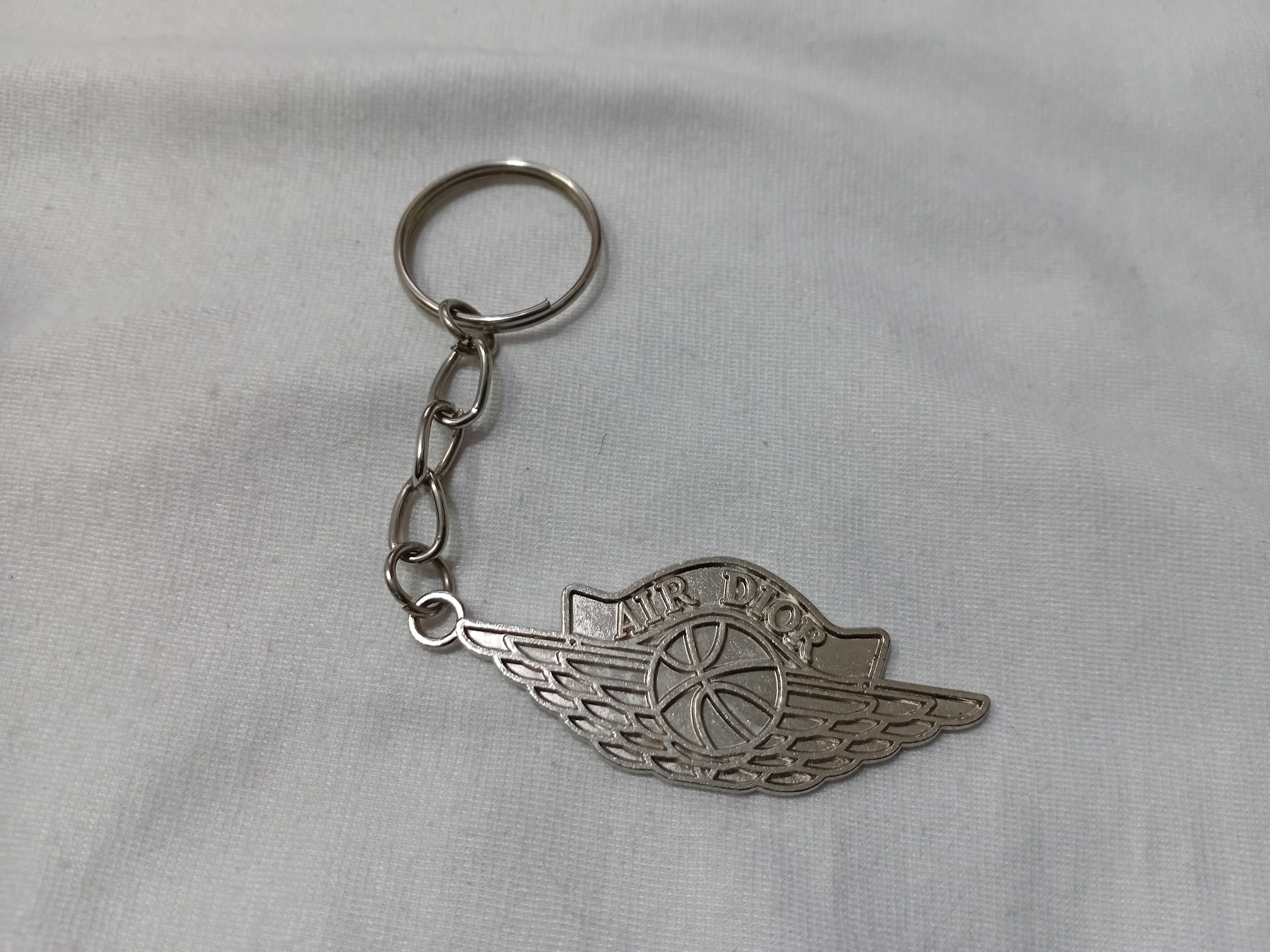 جاکلیدی فلزی بسکتبالی AIR DIOR