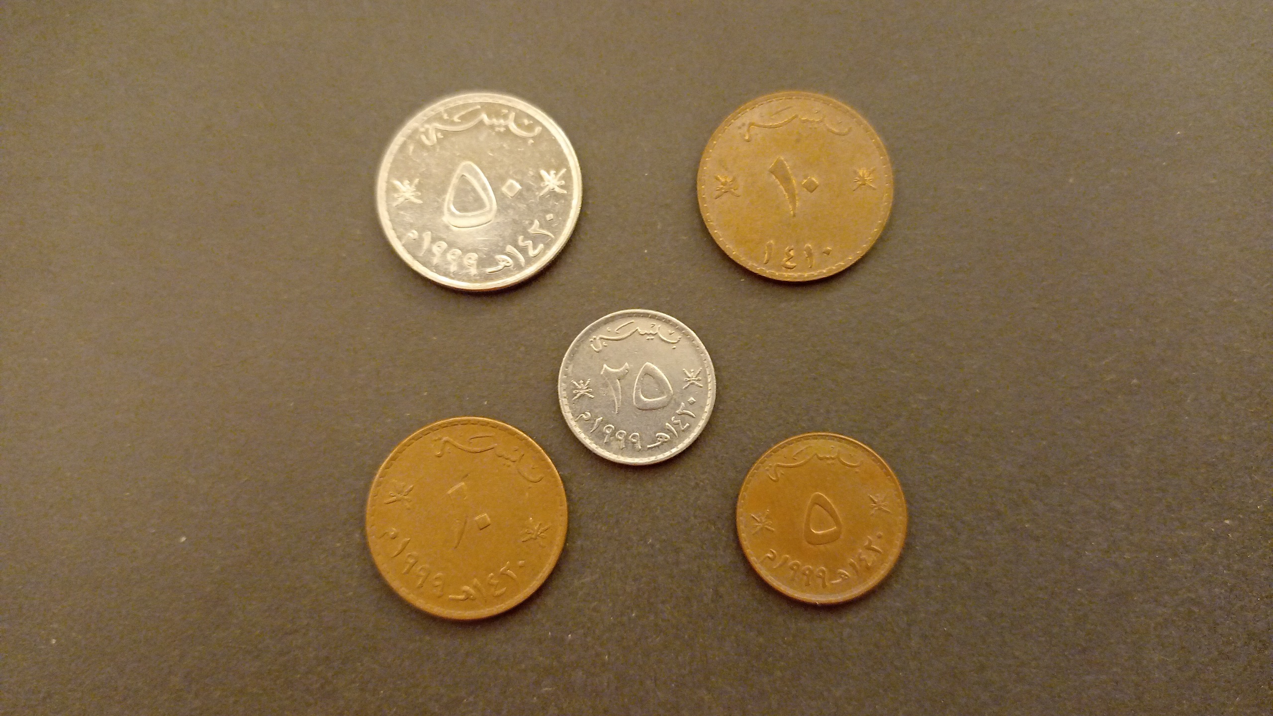 سکه های عمان در چند تیپ