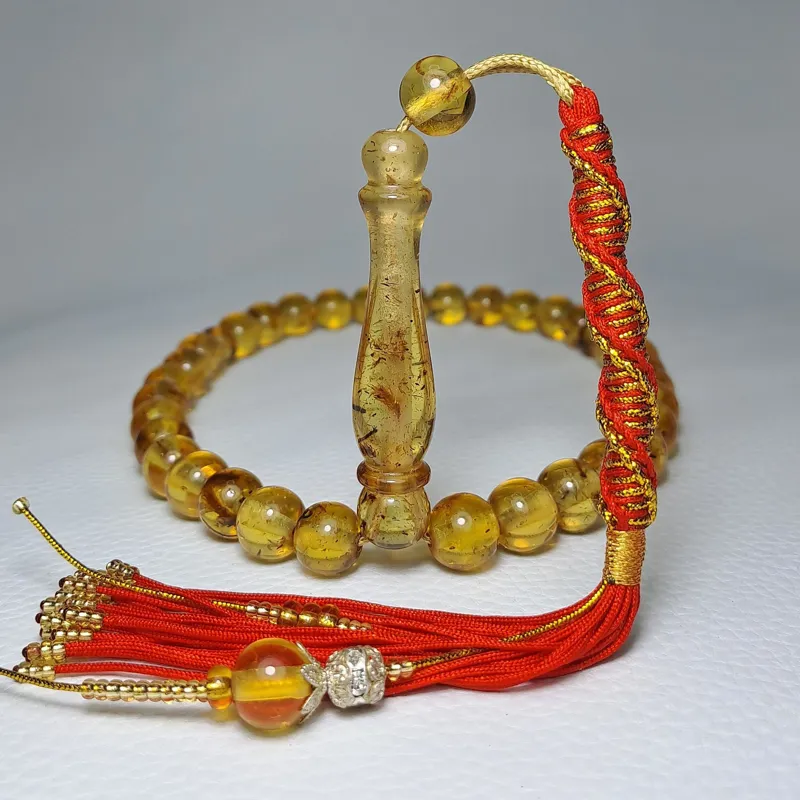 تسبیح کهربا طبیعی طلایی فسیلی