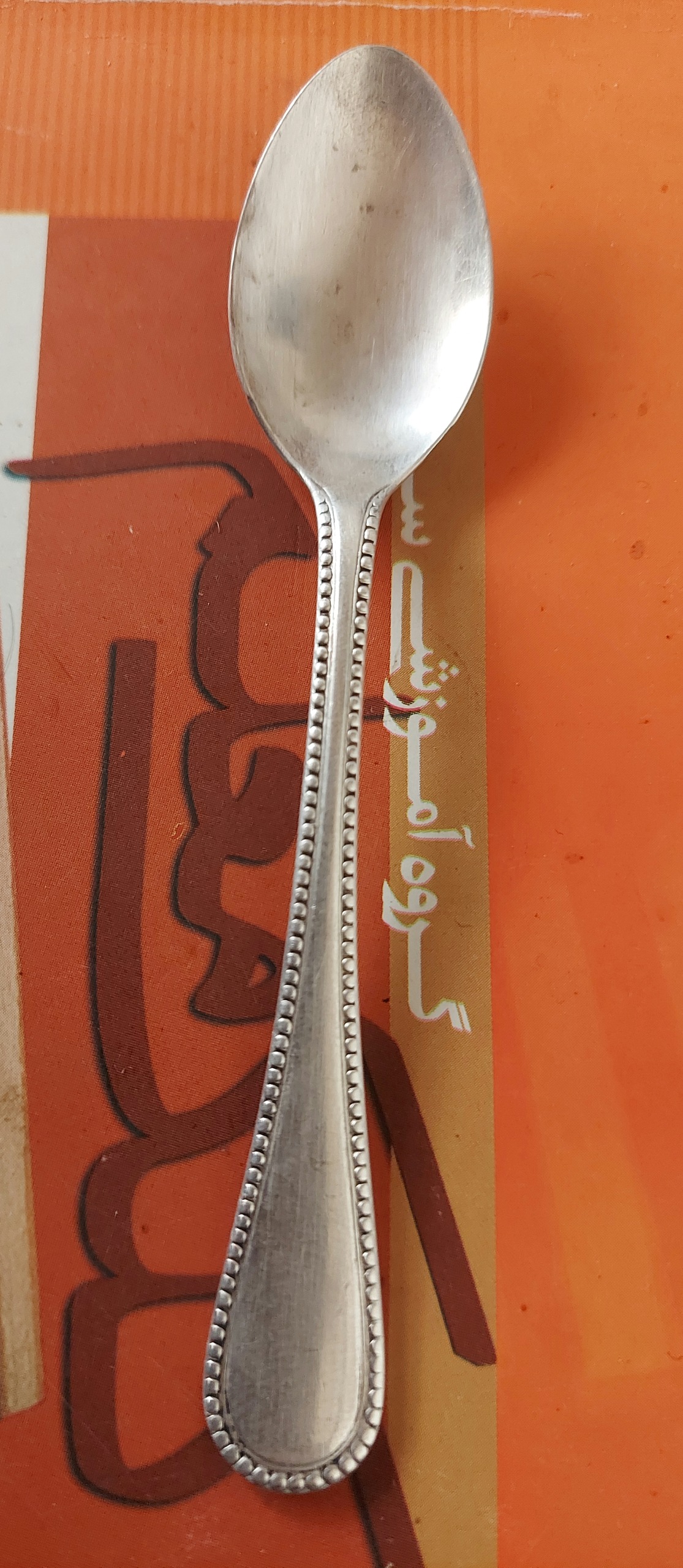 قاشق قدیمی با لایه ای از نقره عیار بالا