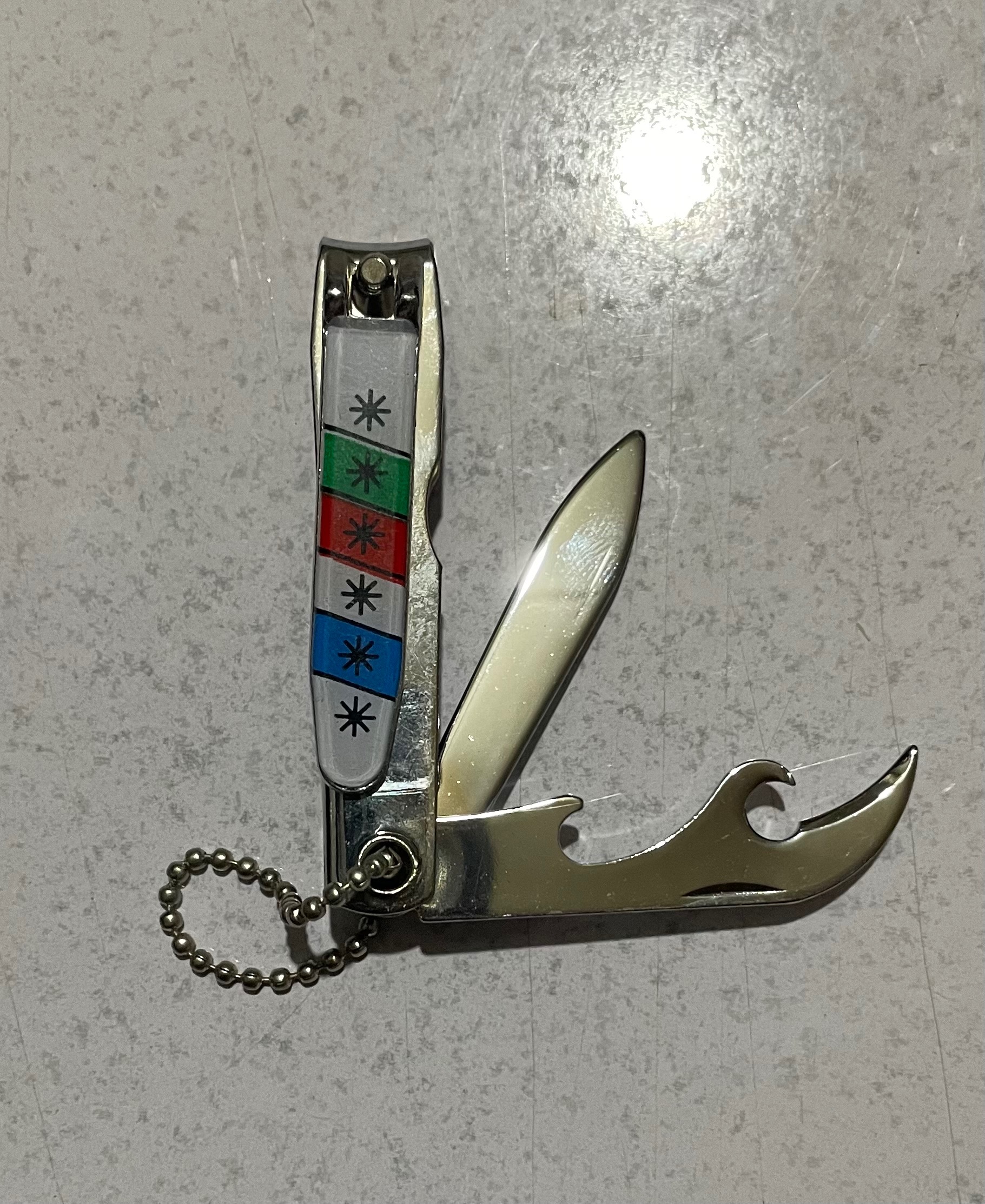 ناخن گیر نوستالوژی دهه شصت چاقو دار دو کاره