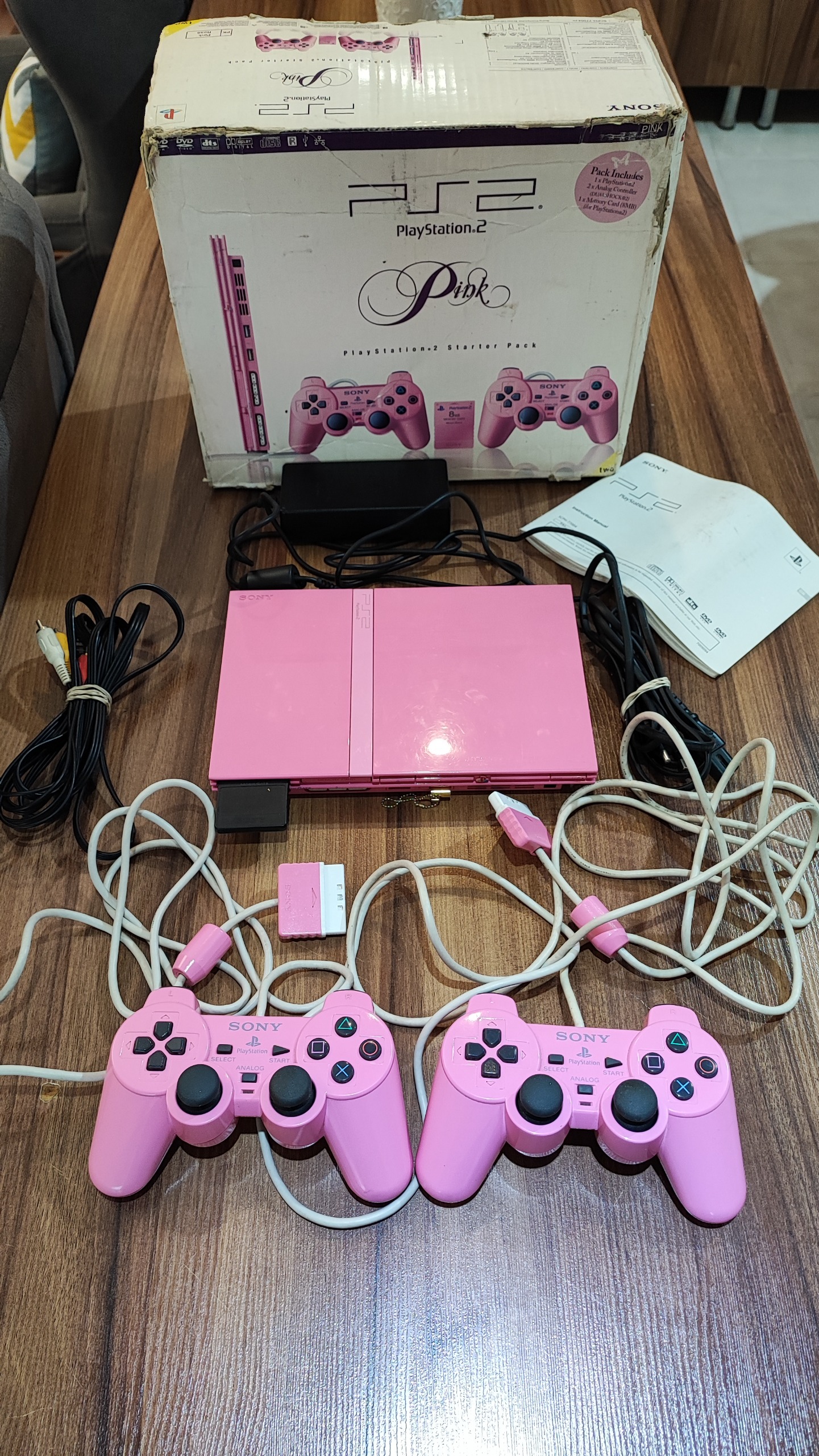 Ps2 صورتی با جعبه