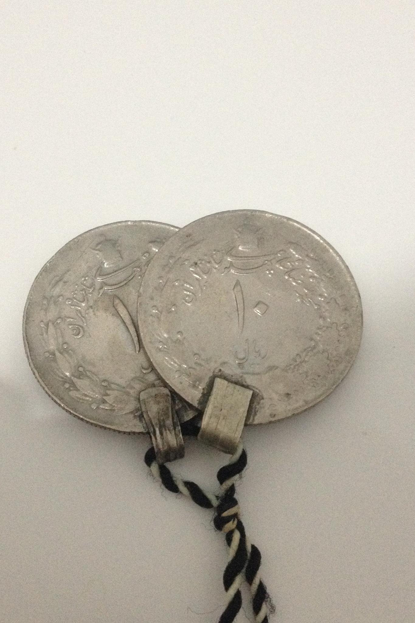 سکه ی 10 ریالی 60 ساله