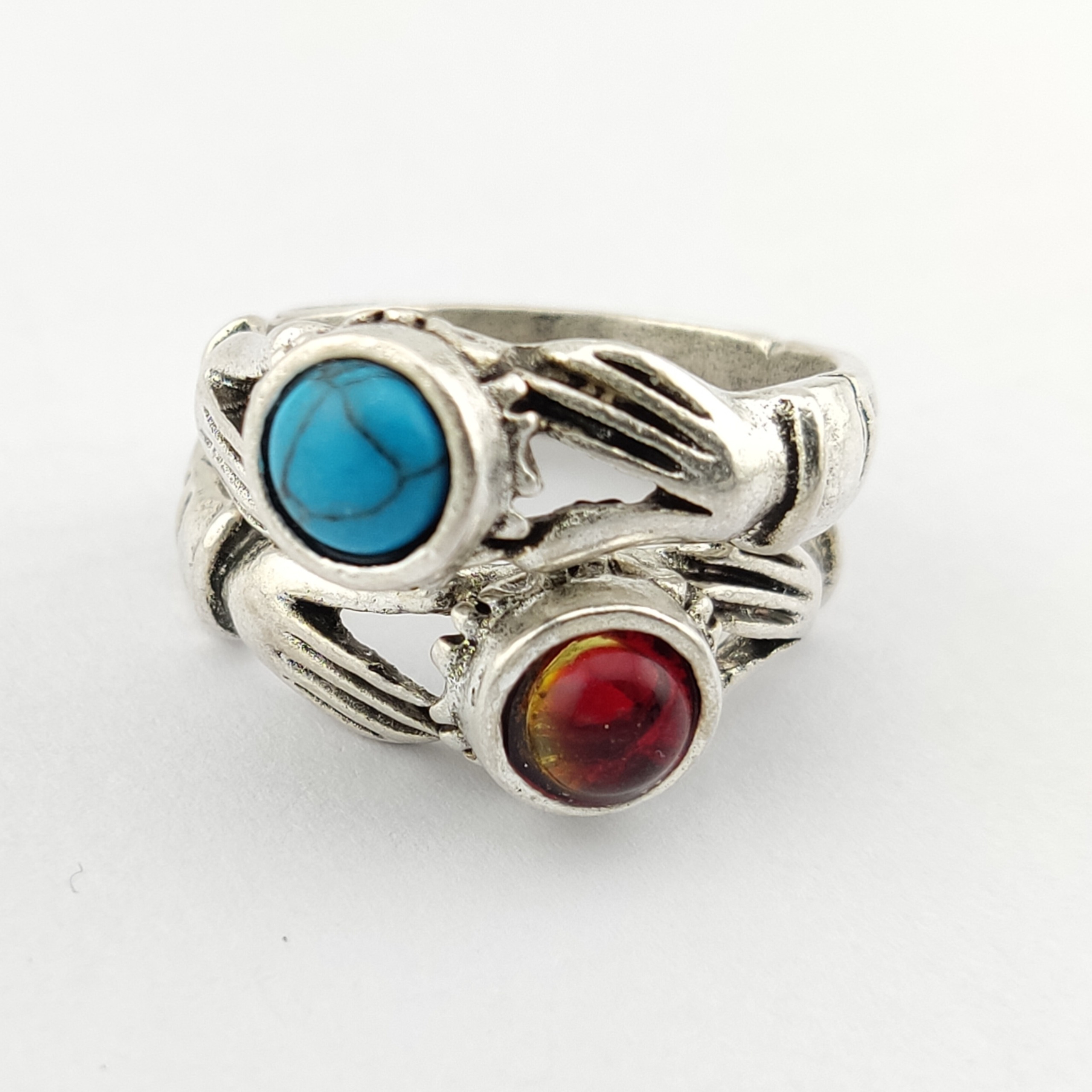 دو انگشتر یاقوت و فیروزه با رکاب نقش دست بی همتا