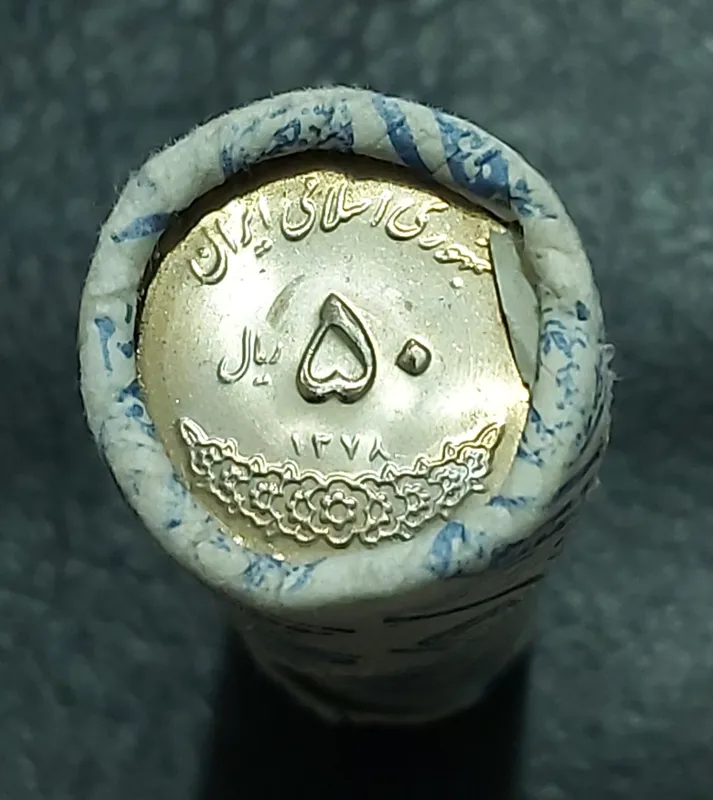 رول 5 تومنی معصومه 1378 چسب خوردگی دارد