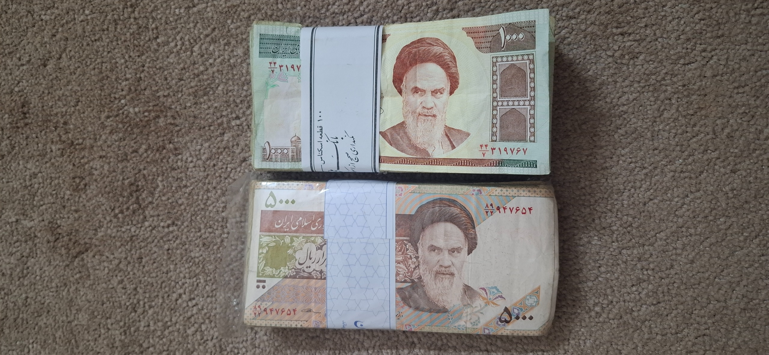 2 بسته اسکناس کارکرده 100 و 500 تومنی