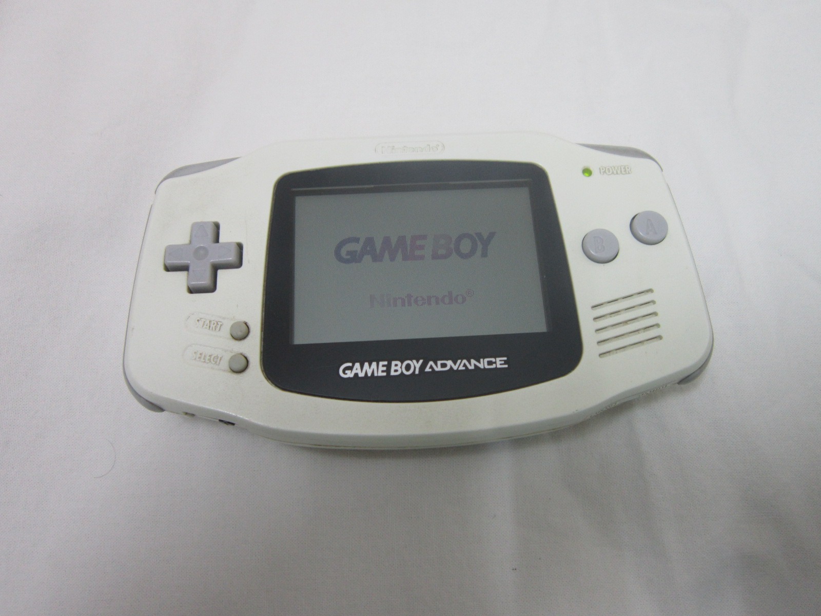 گیم بوی ادونس سفید با کارتریج بازی X-MEN