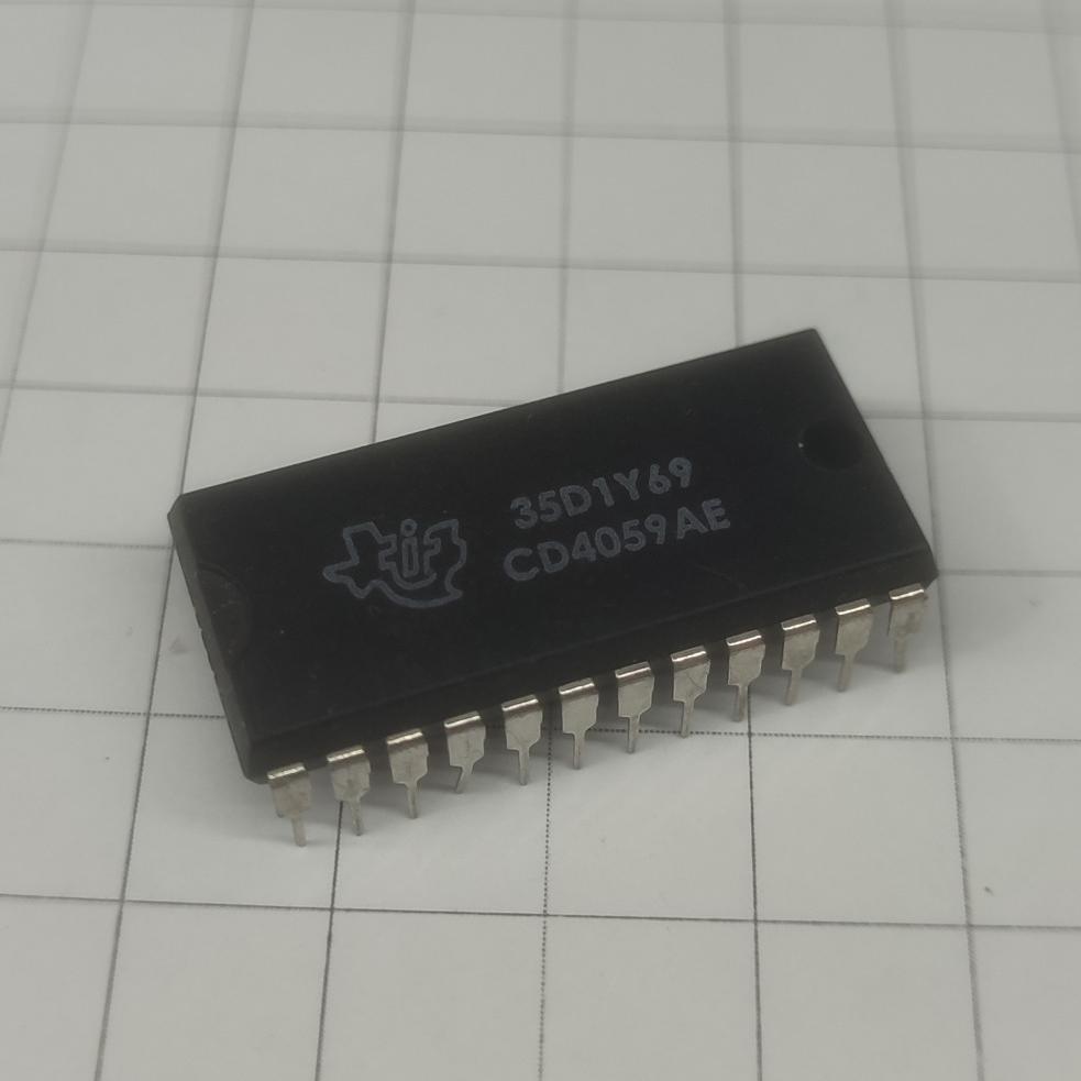 آی سی CD4059 برند texas instruments