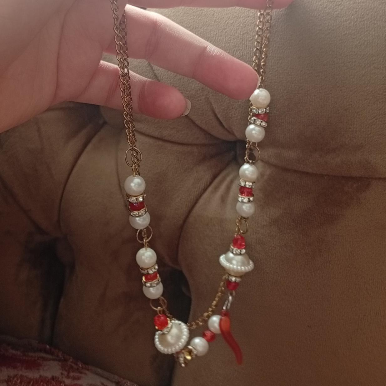 آویز رو لباسی طرح مرواریدی مشابه طلا بلند و خاص