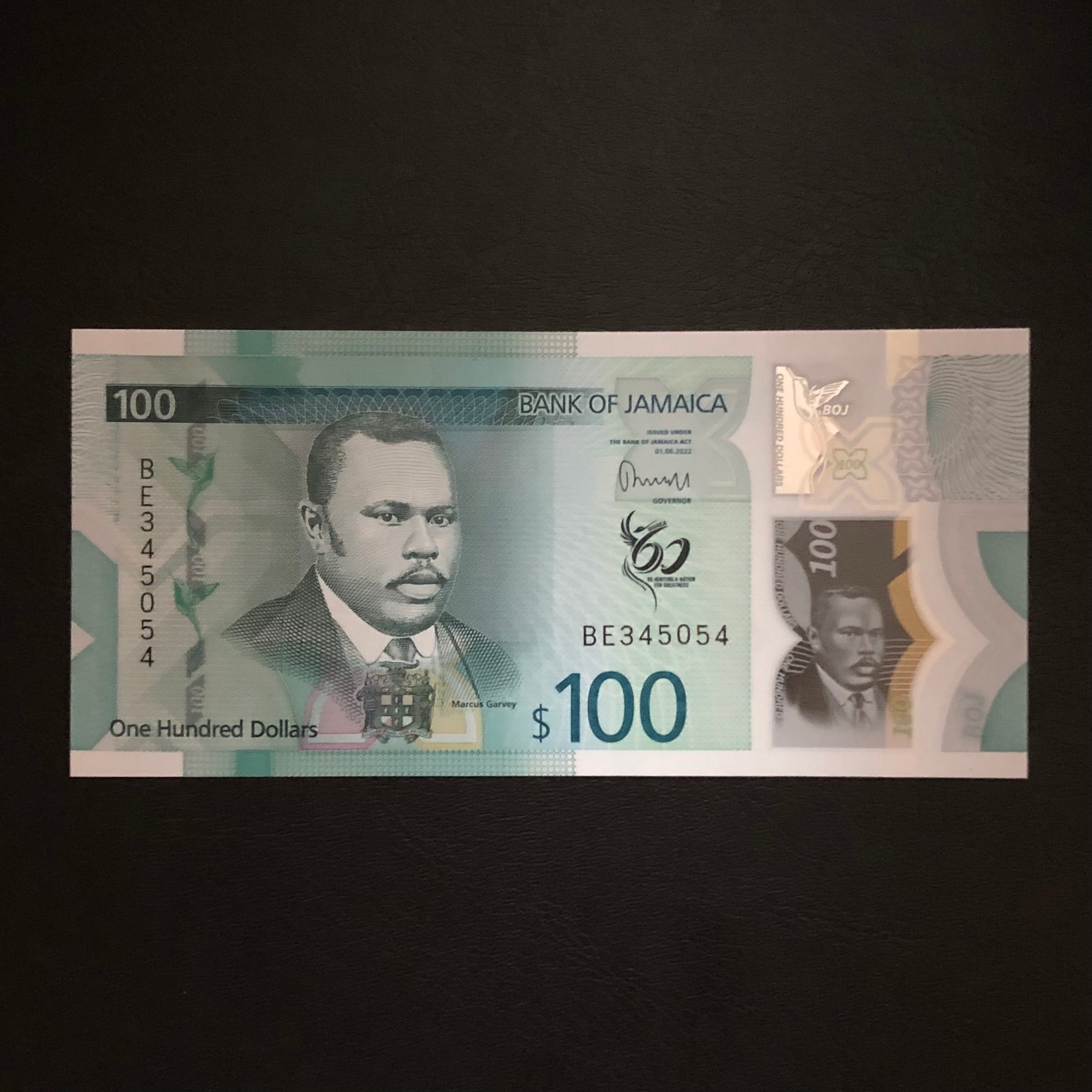 اسکناس تک بانکی 100 دلار جامائیکا شماره متفاوت