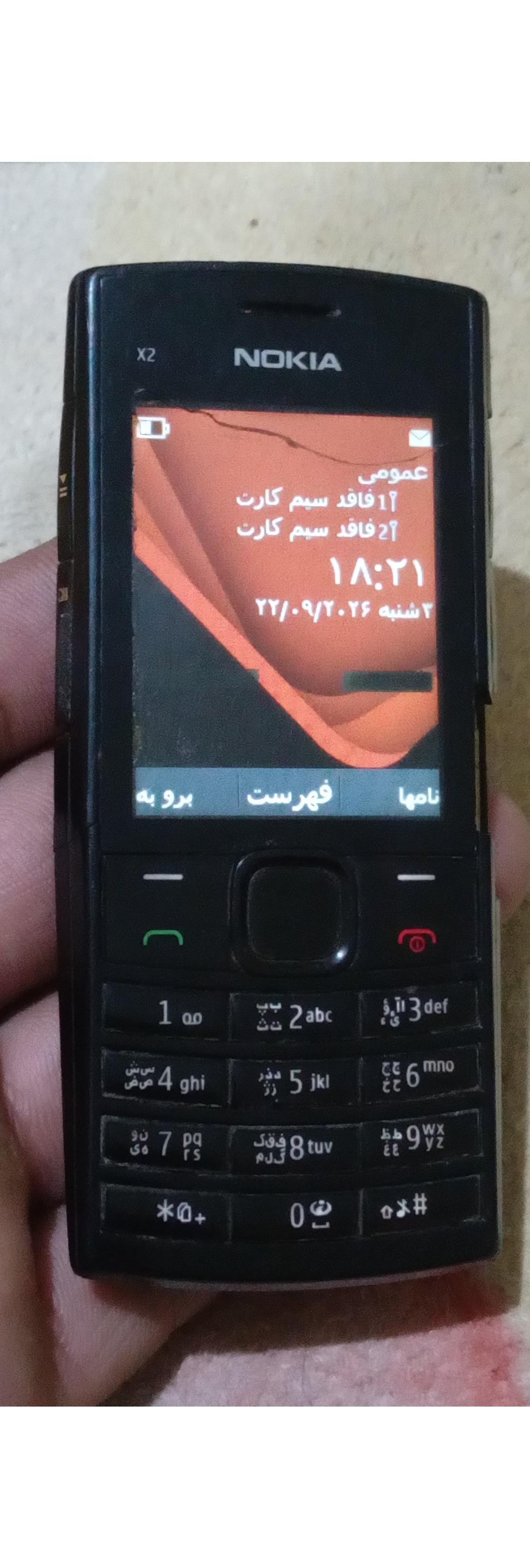 نوکیا x2سالم نیاز به رسیدگی داره توضیحات داره