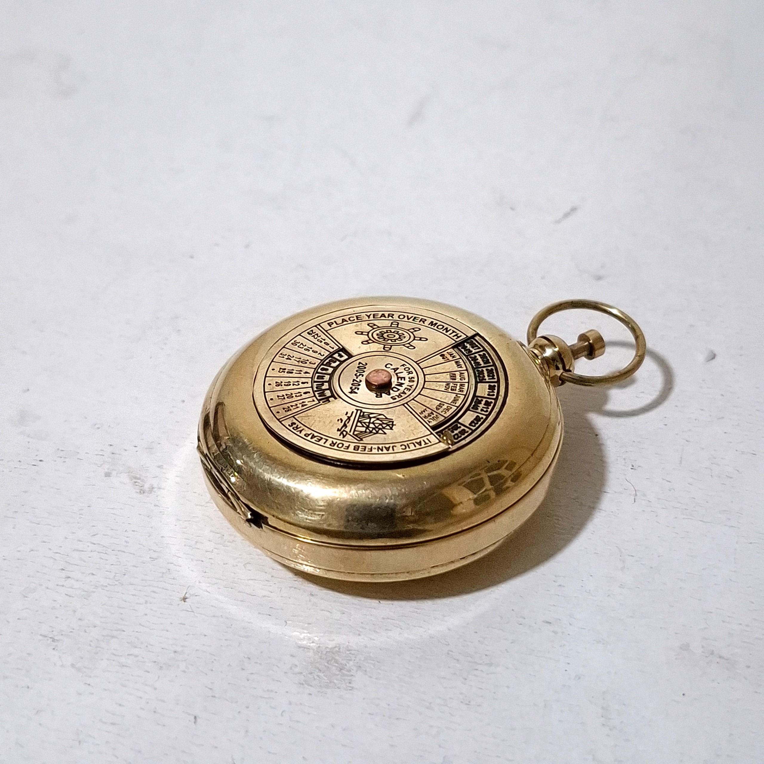 قطب نمای برنجی آنتیک کمیاب تقویم دار قطب نما انتیک