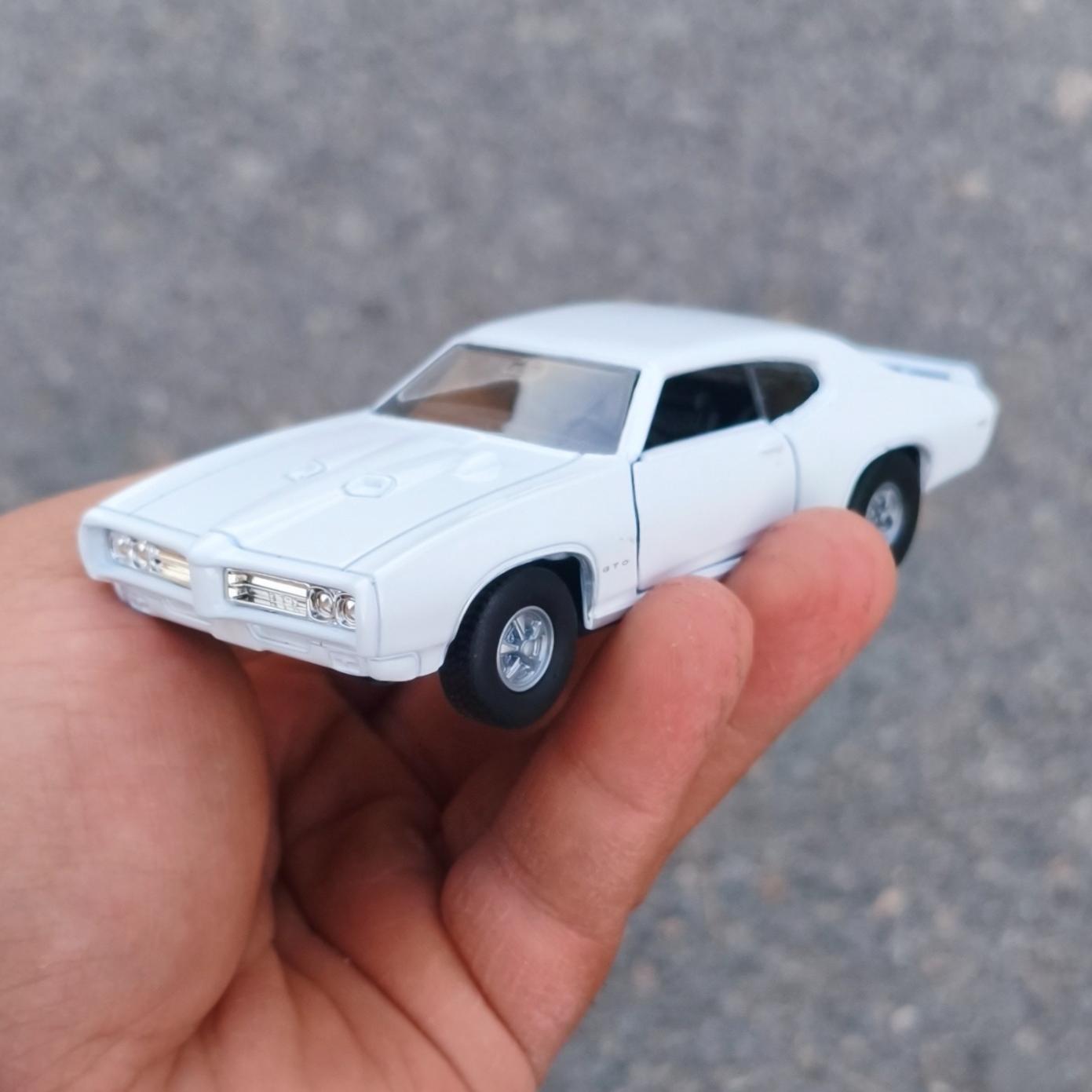 ماکت ماشین Pontiac GTO 1969 . برند WELLY