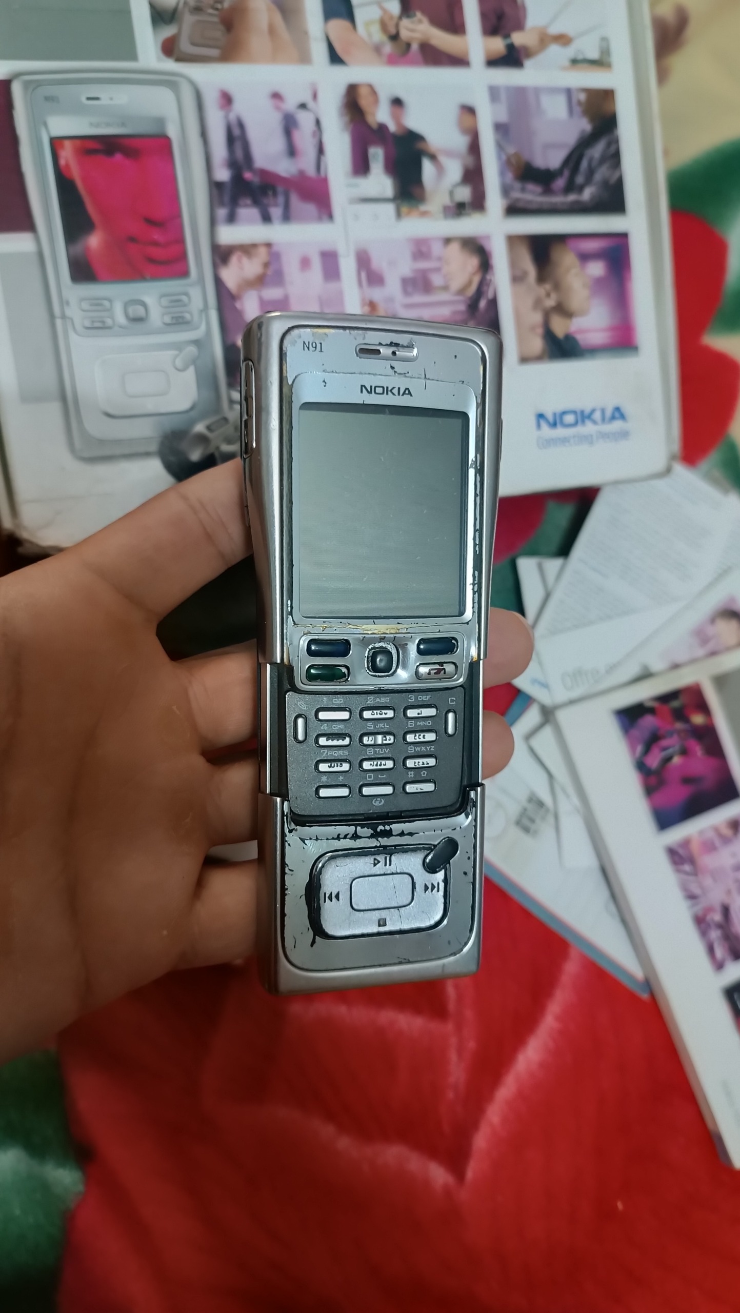 گوشی نوکیاقدیمی N91معیوب همراه شارژر و جعبه