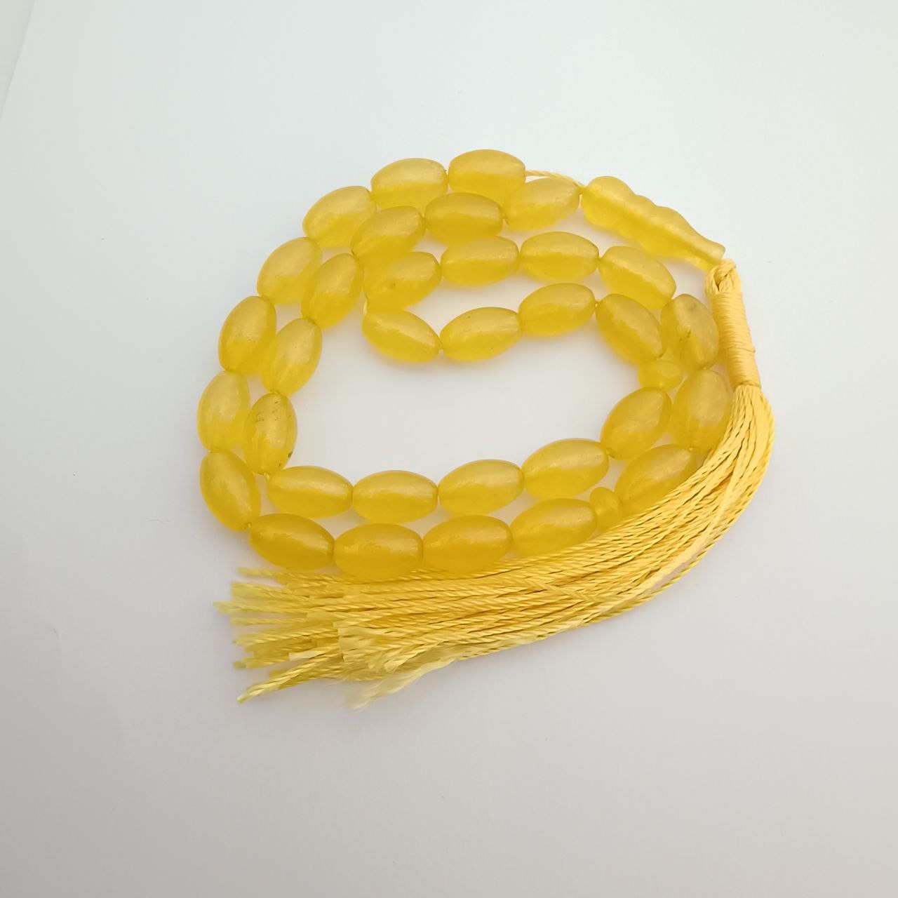 تسبیح جید زرد 33 دانه ط350
