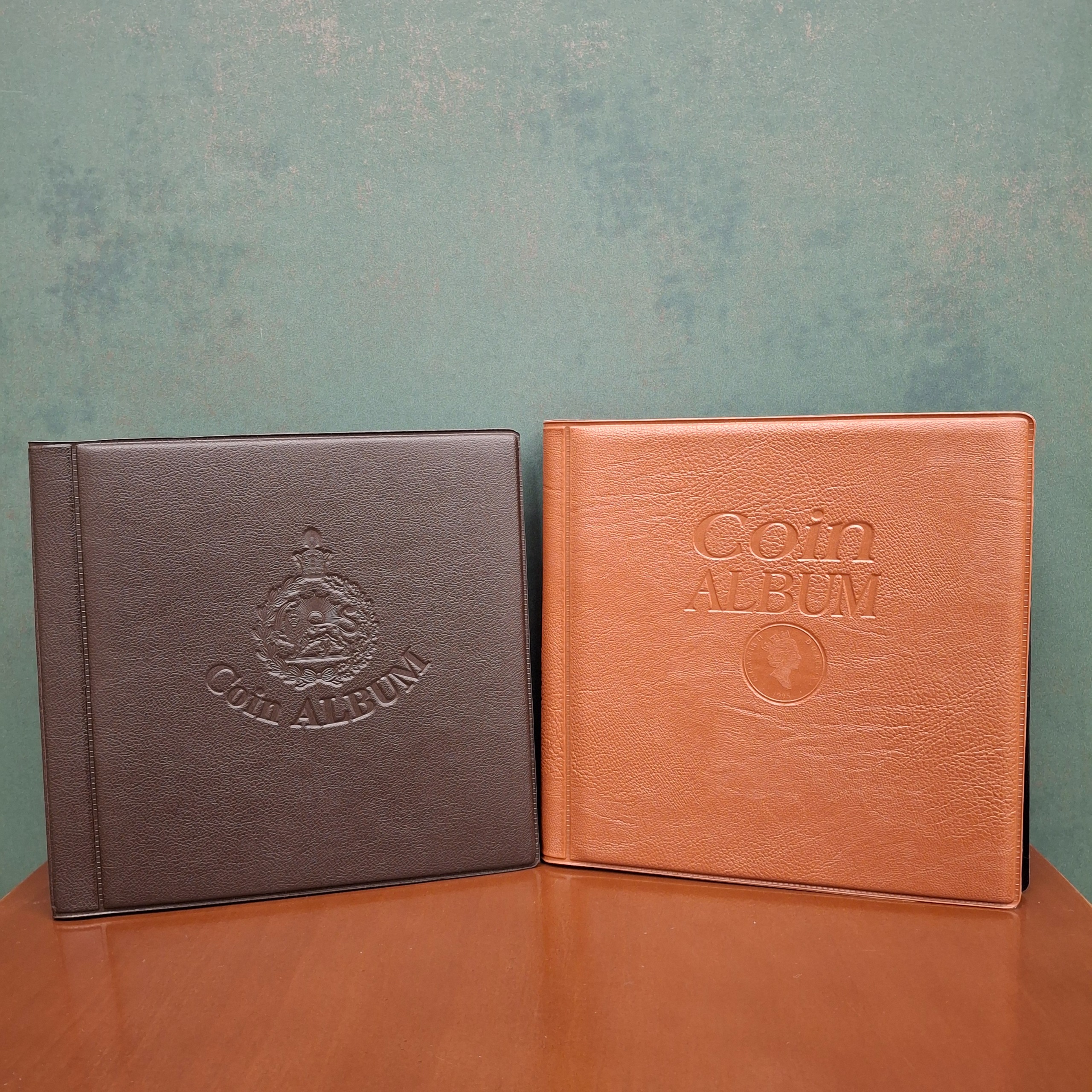 دو عدد آلبوم سکه (با طرح ملکه و شیر و خورشید)