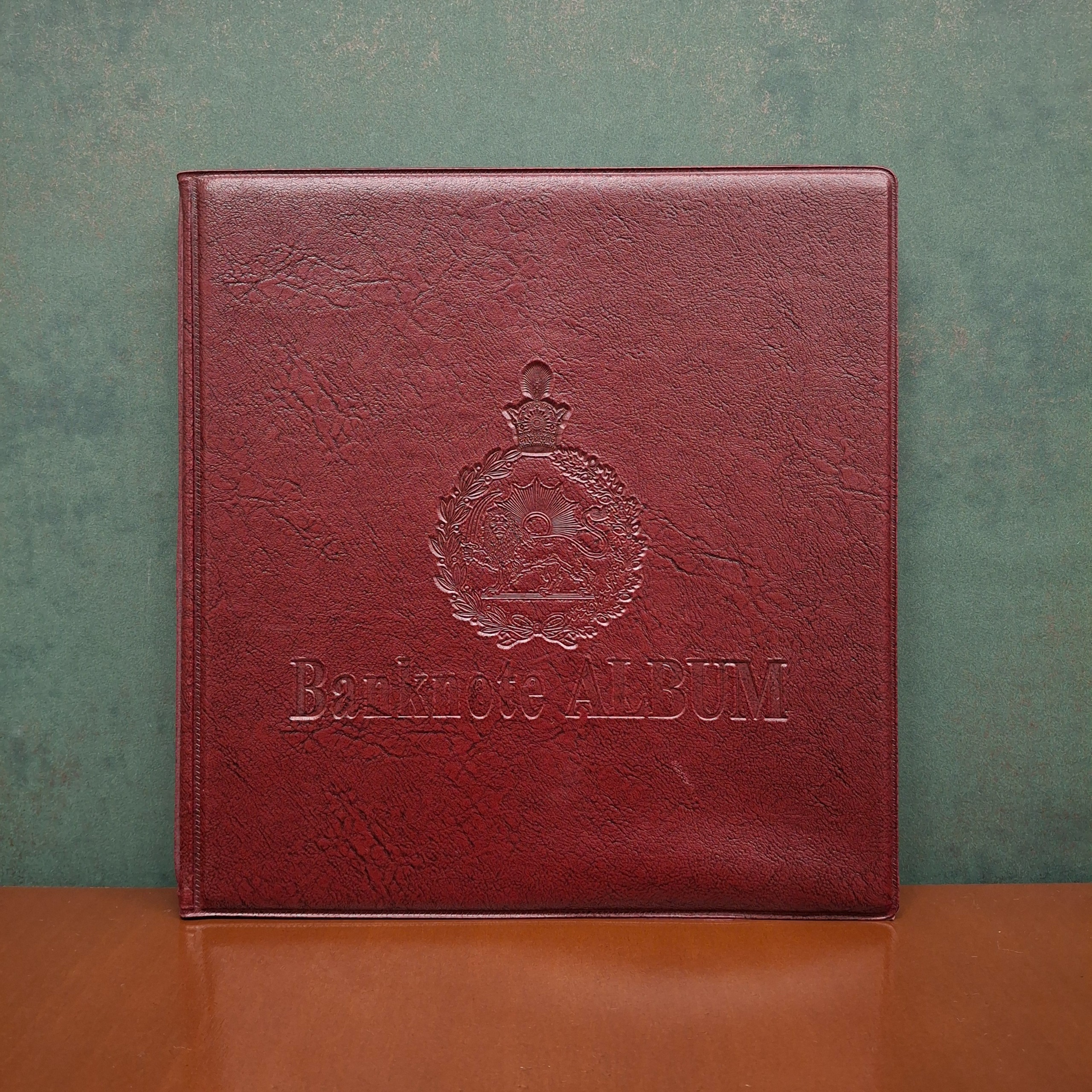 آلبوم اسکناس شیروخورشید 80 عددی (زرشکی)