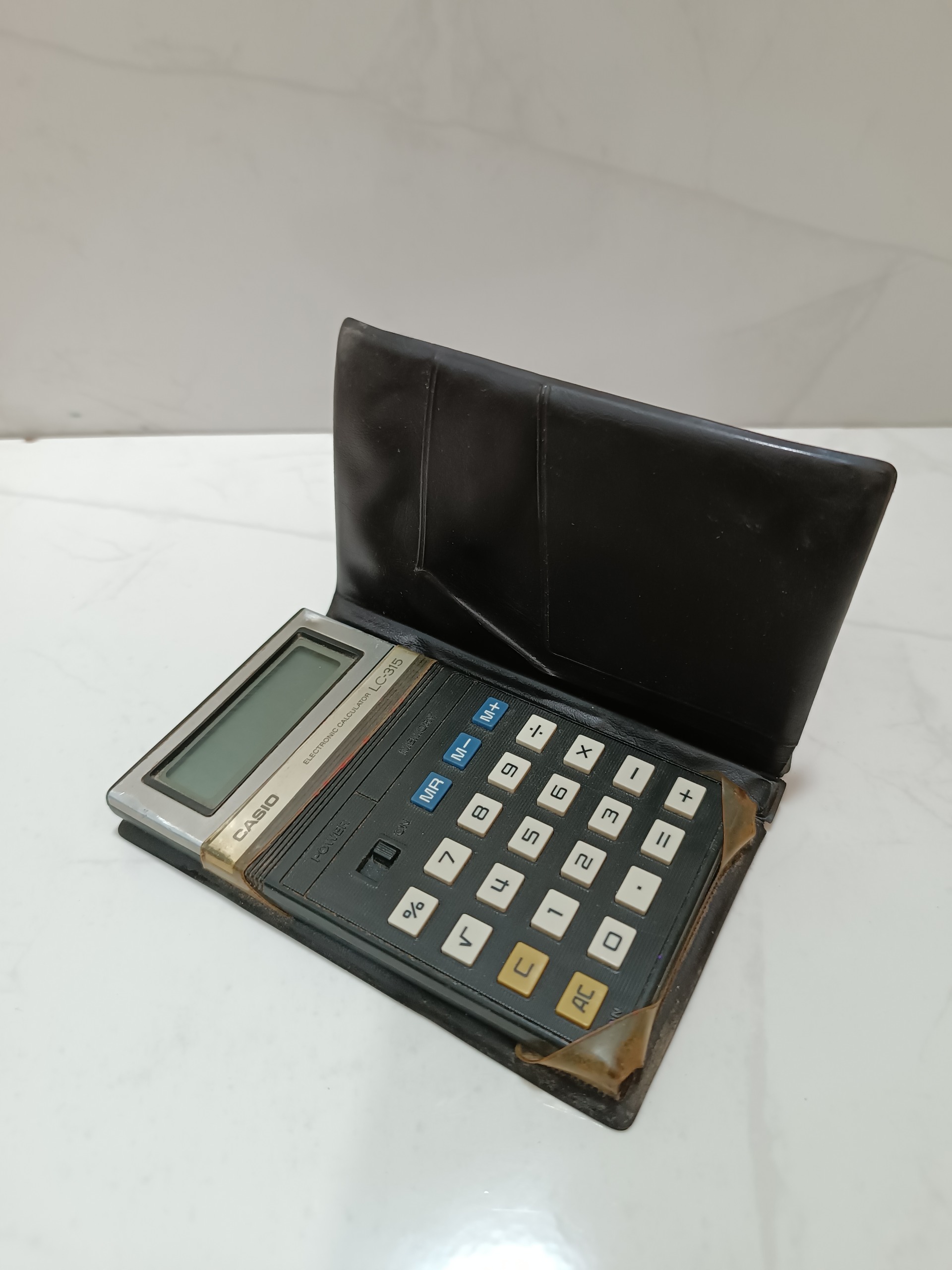 ماشین حساب کلکسیونی کاسیو lc-315 کیف چرمی