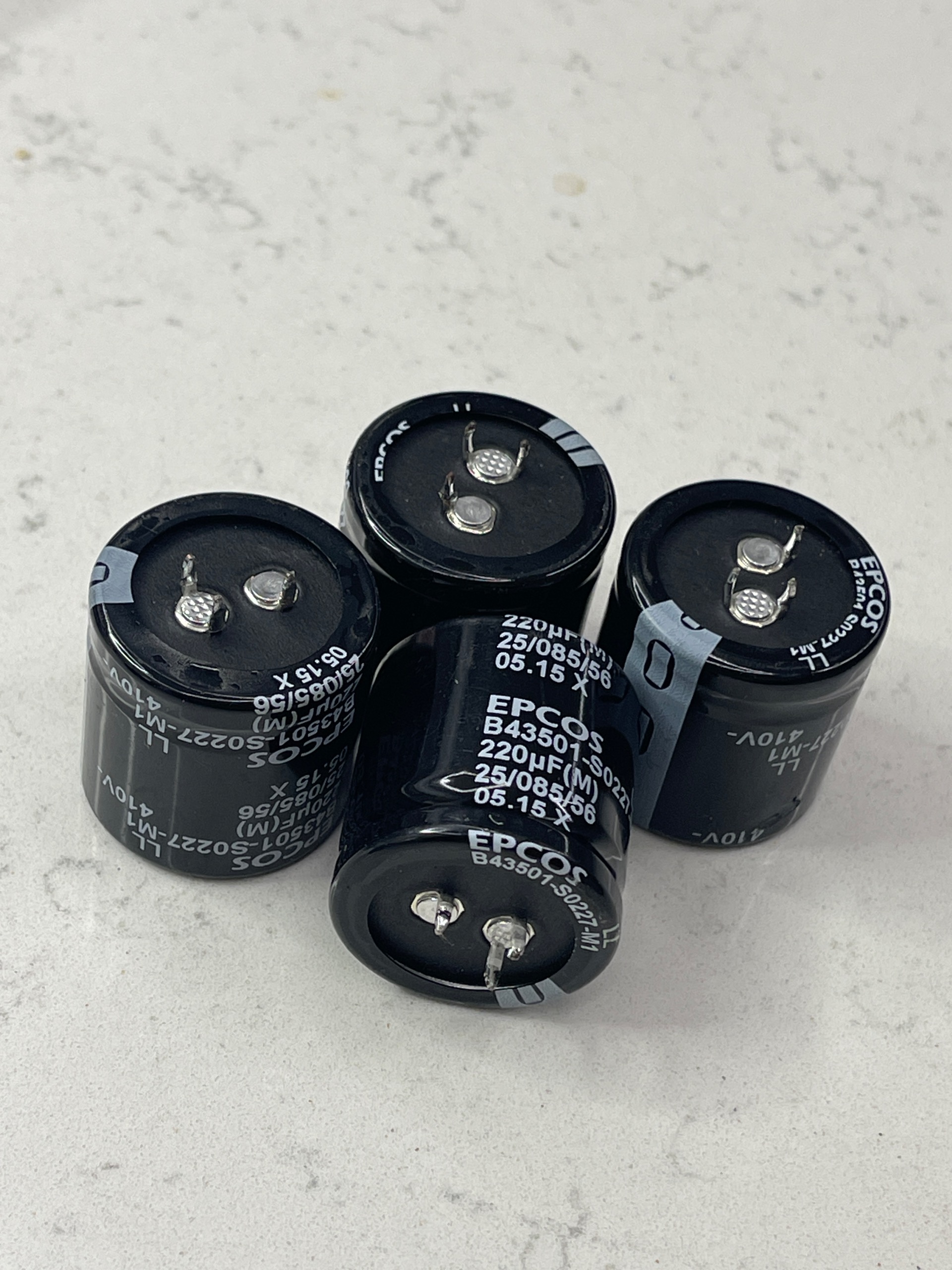 بسته 4 عددی خازن 220uf 410v اپکاس اورجینال