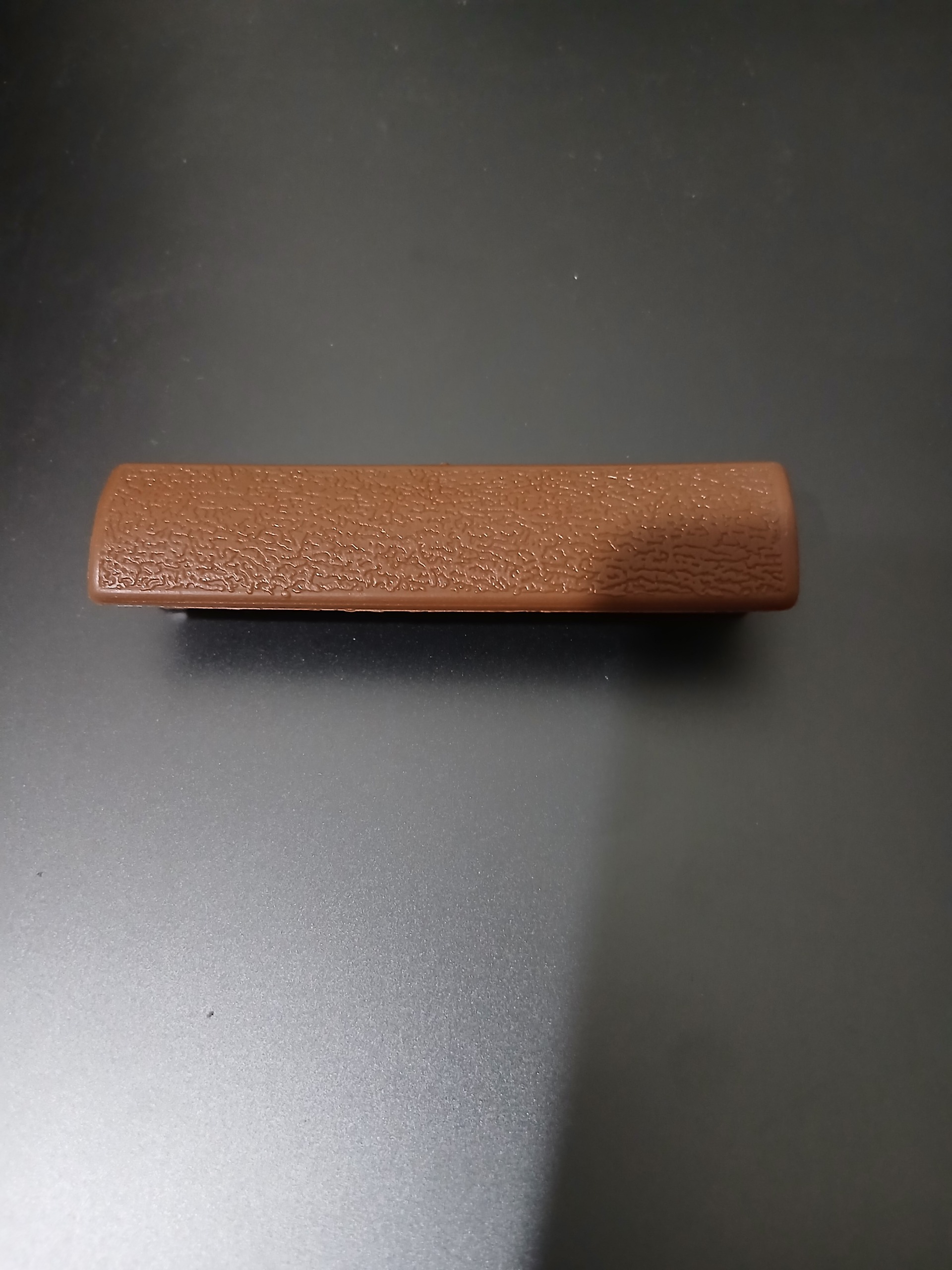 دستگیره درب داشبورد نیسان کرم شکلاتی