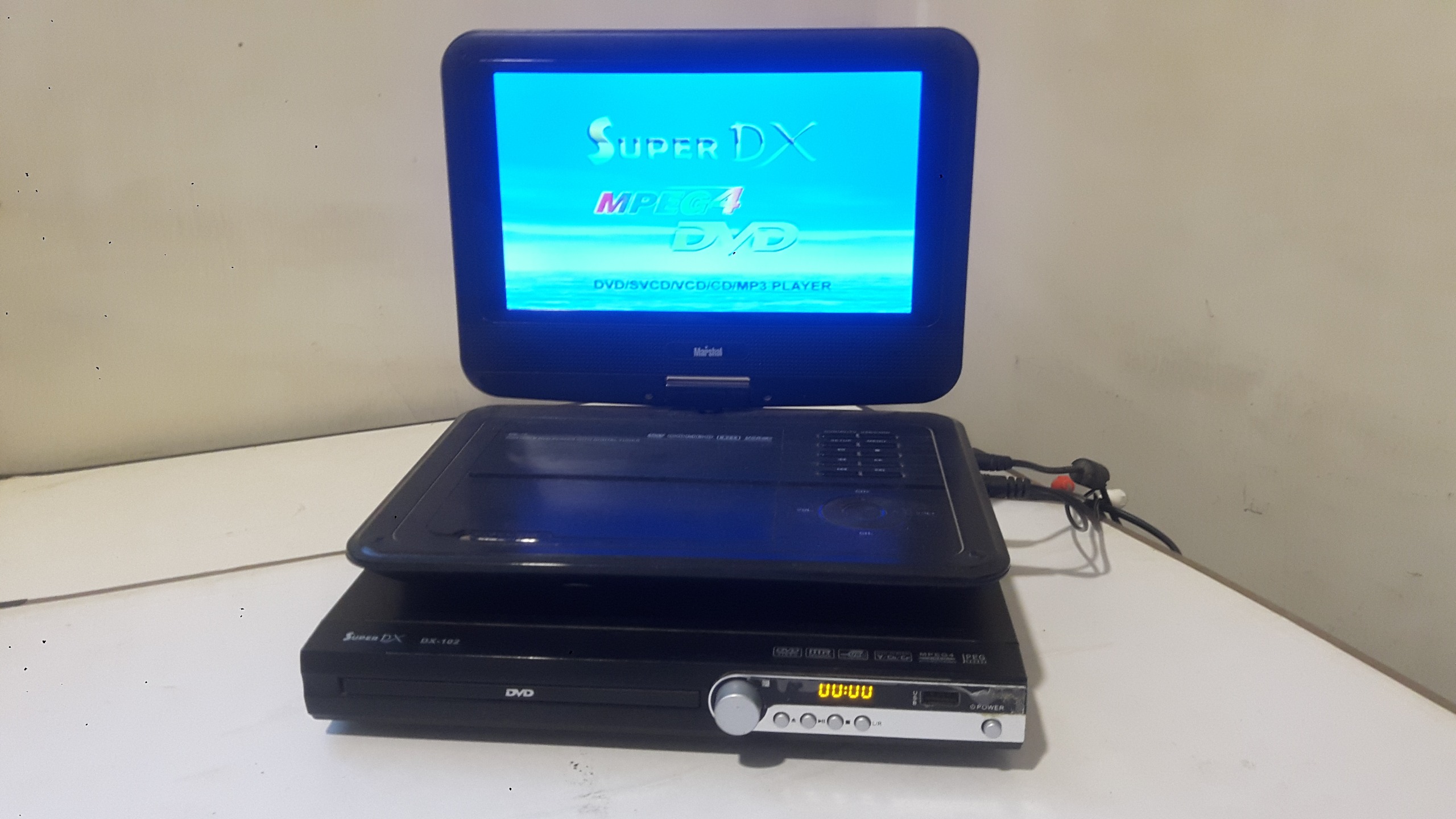 DVDپلیر فلش خورSuperDXمدل DX102توضیح دارد