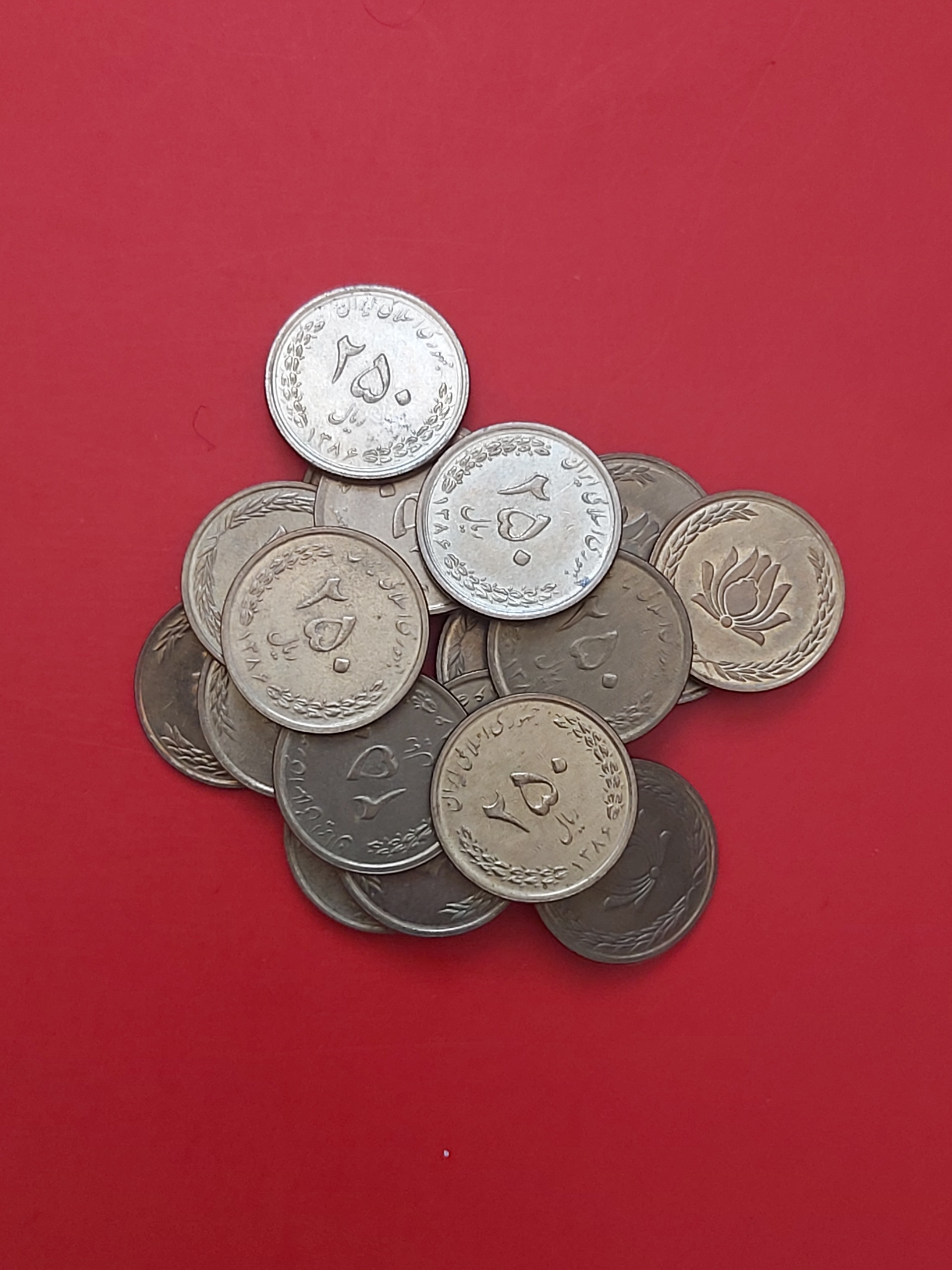250 ریالی گل انار برنز 20 عدد