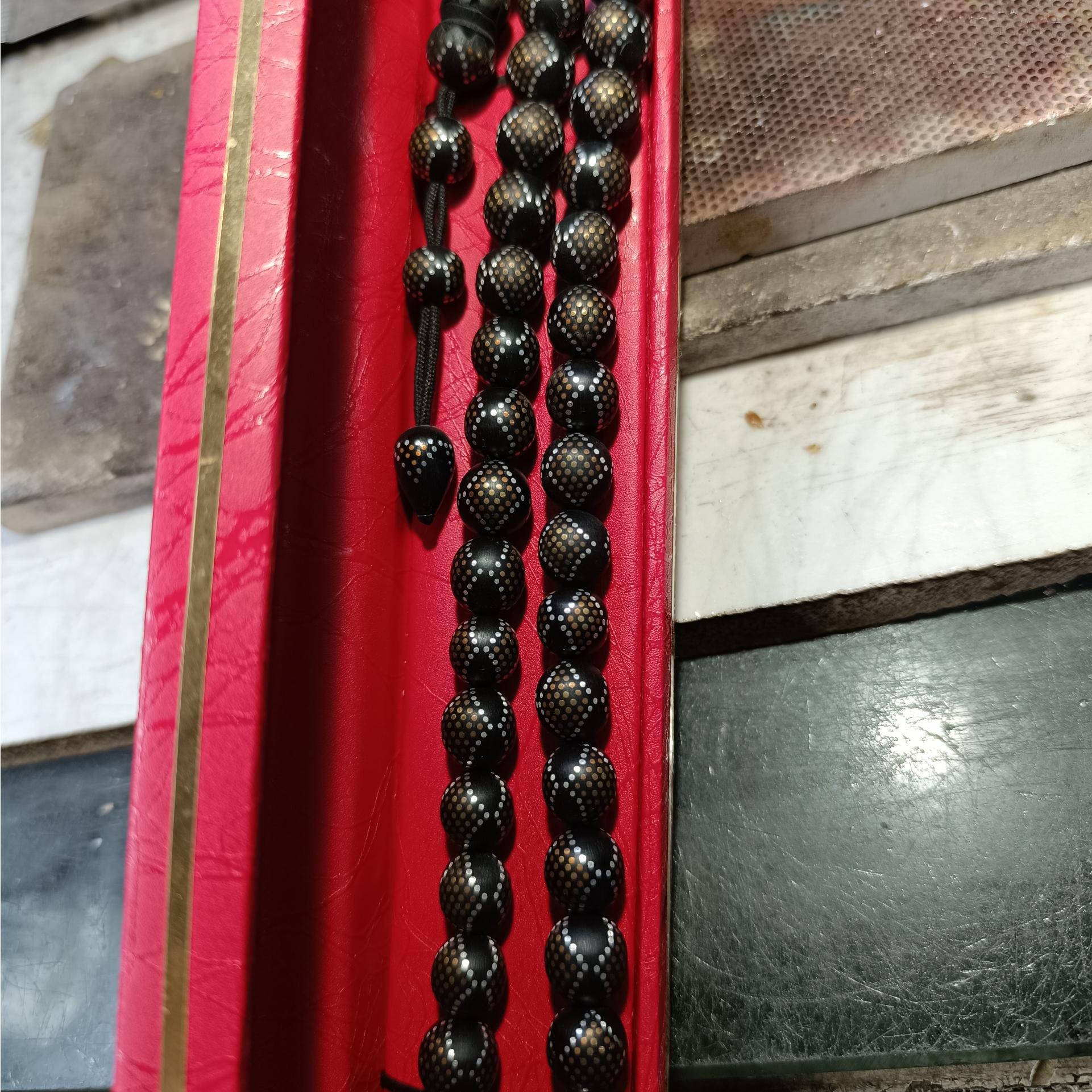 تسبیح میخ کوب هسته خرما