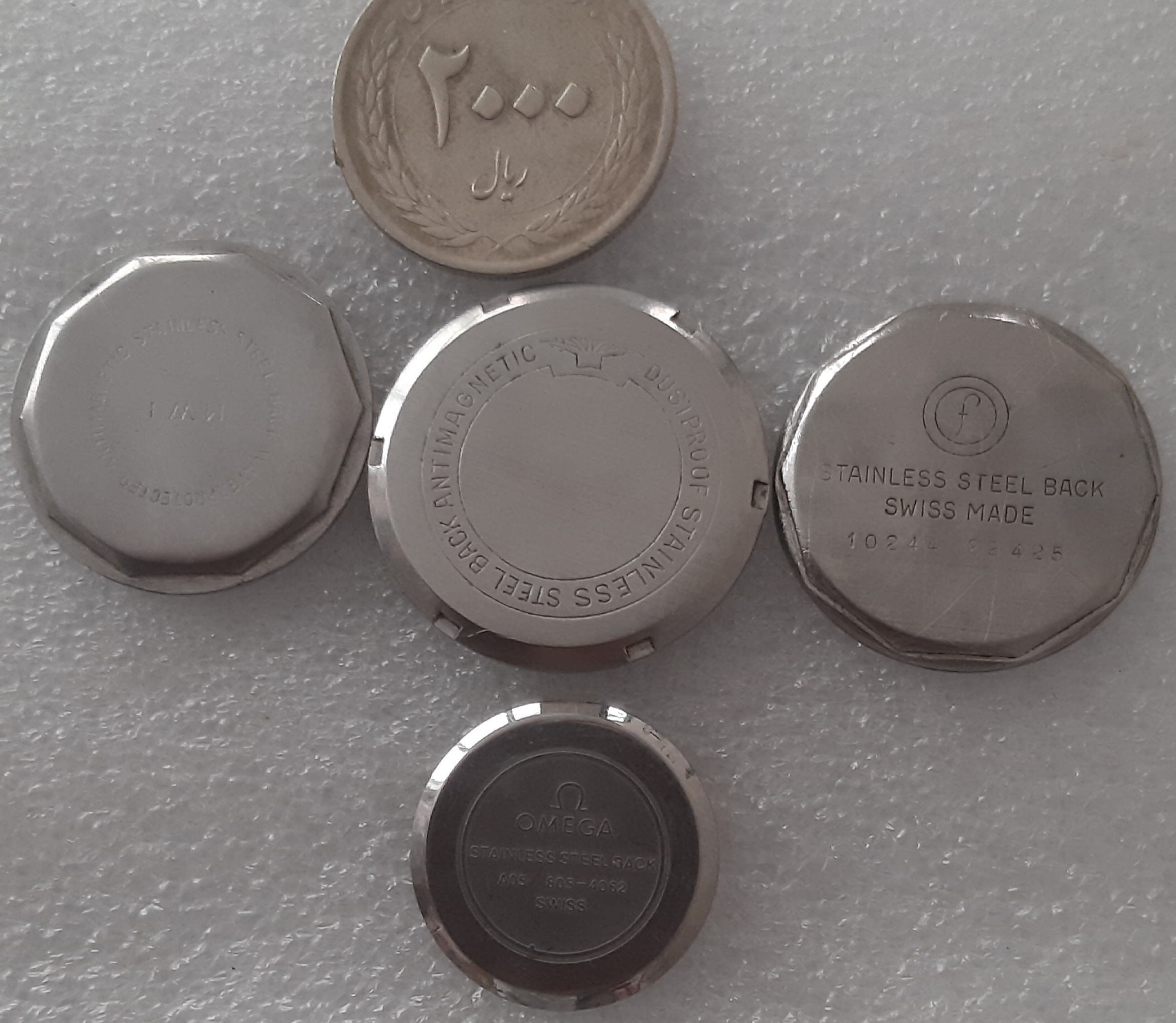 درب پشت ساعتهای سویسی، فیلکا،اومگا زنانه و