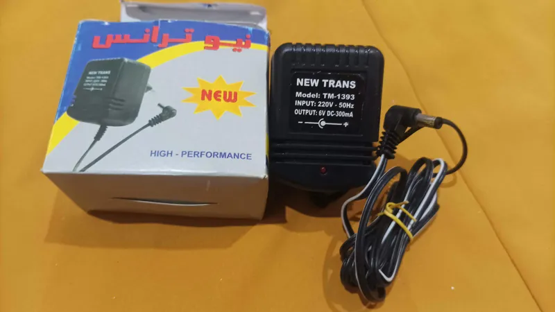 مزایدةآداپتور6ولت300میل آمپرقوی وبی کابل