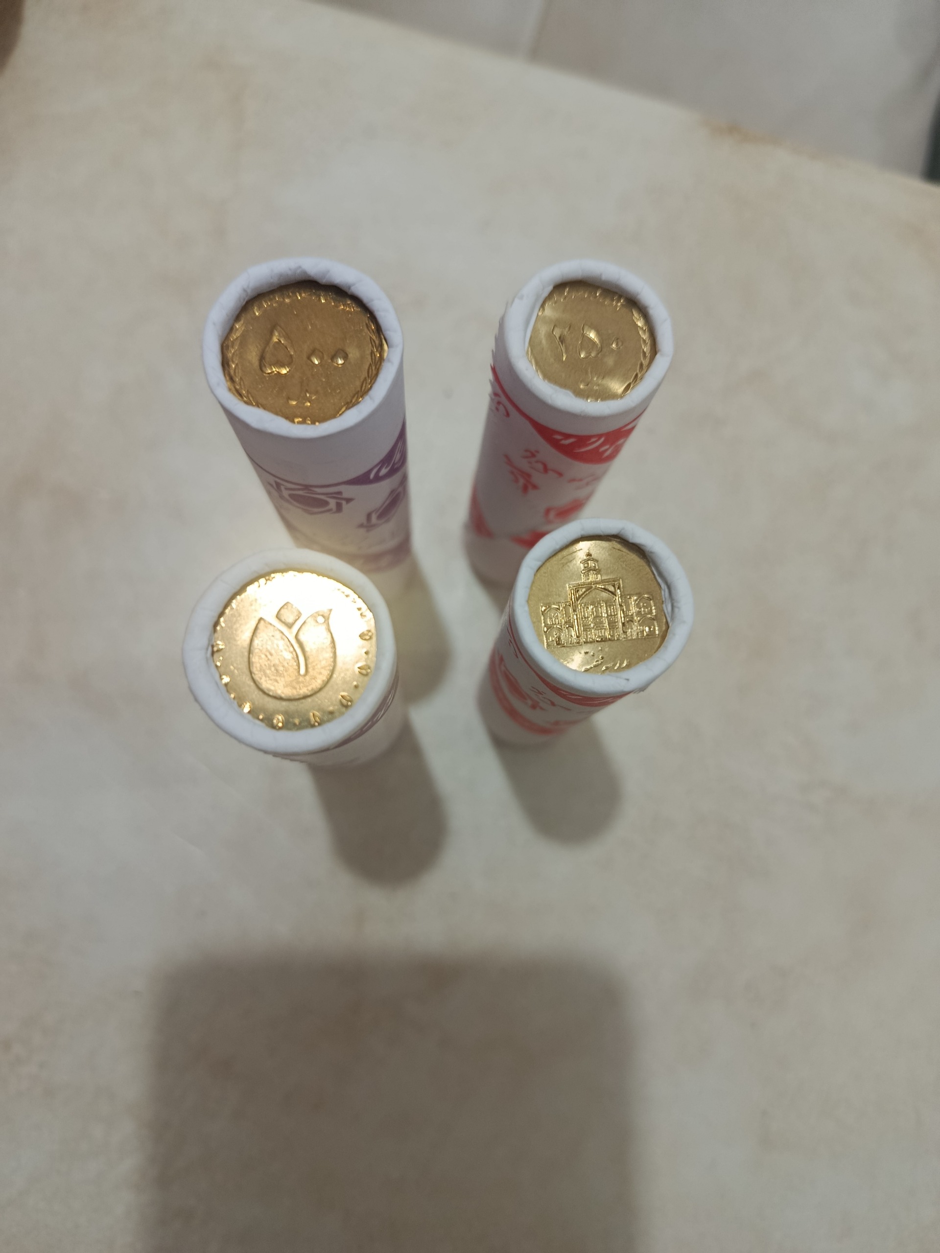 4 رول سکه25 تومانی و50تومانی