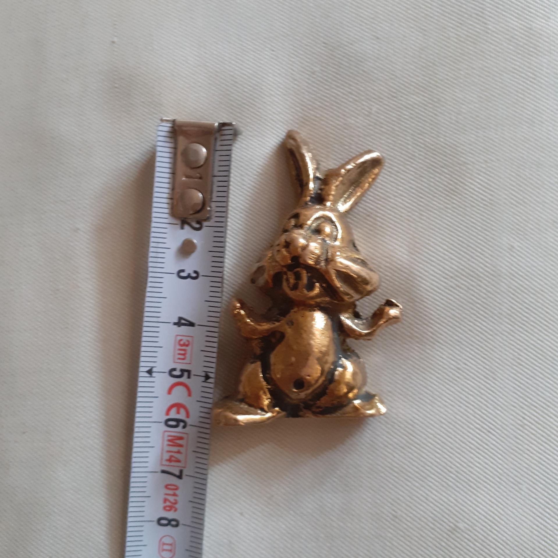 خرگوش تمام برنجی تو پر نقلی زیبا مطابق تصویر