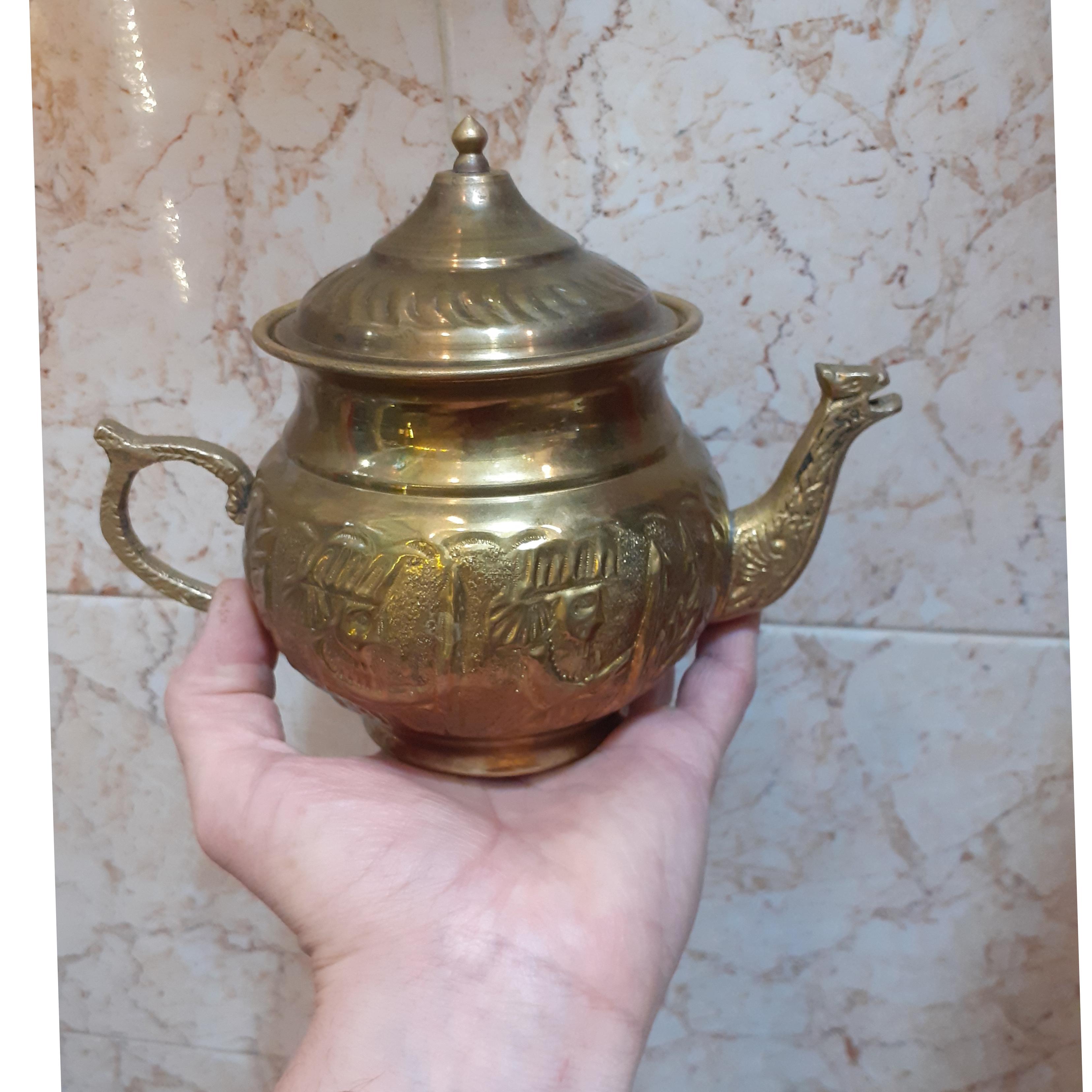 قوری برنجی ساده و نقش نگار هر عدد 980 هزار تومن