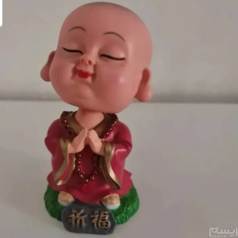 مجسمه پسرک چینی