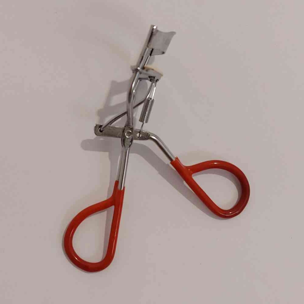 فرمژه فلزی دسته قرمز مژه فر کن دستی
