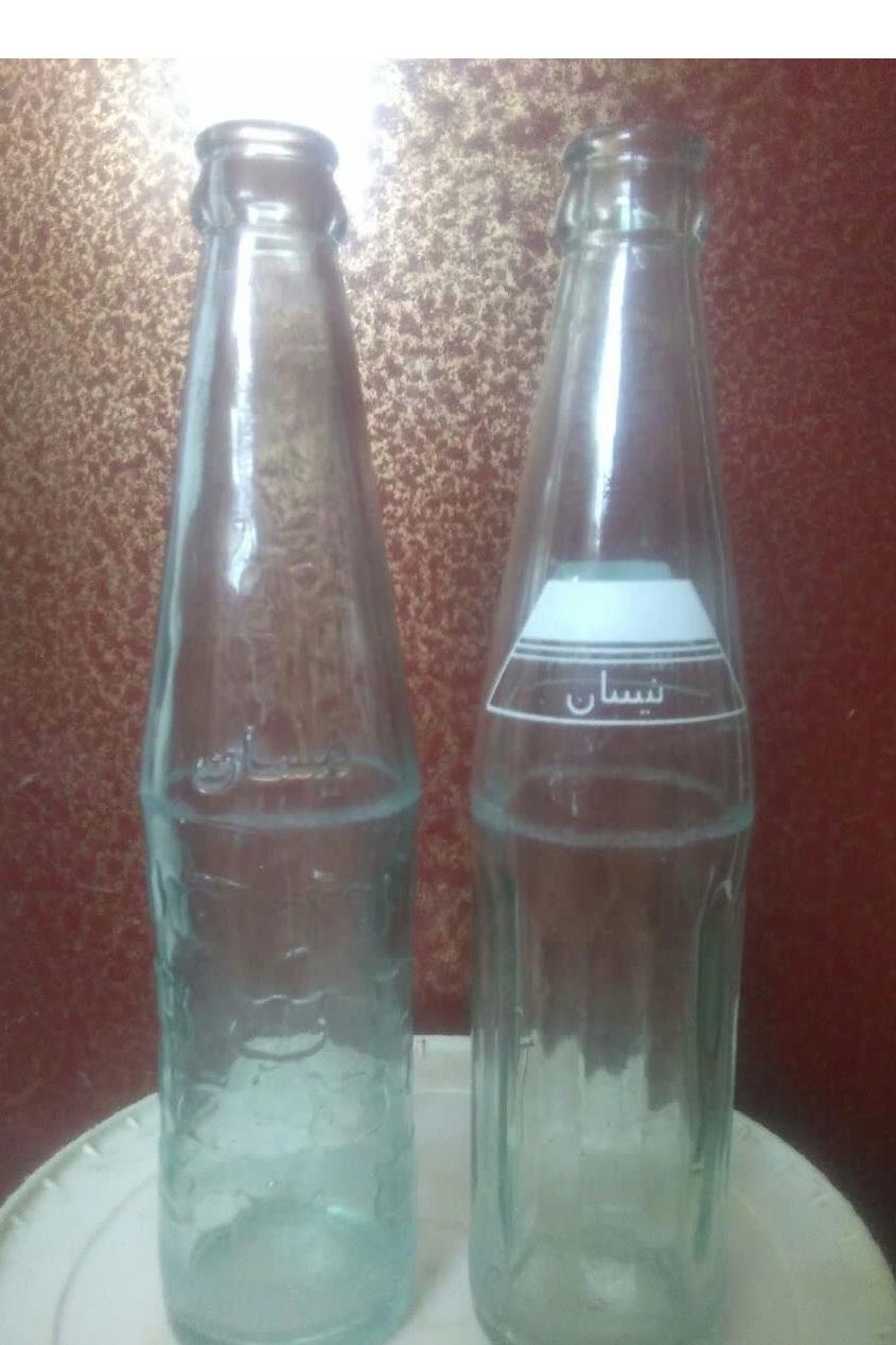 2 شیشه نوشابه نیسان یکی حروف برجسته