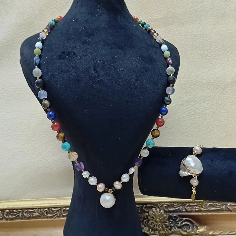 گردنبندودستبند زنانه مروارید شاهکار جواهراتی سنگی