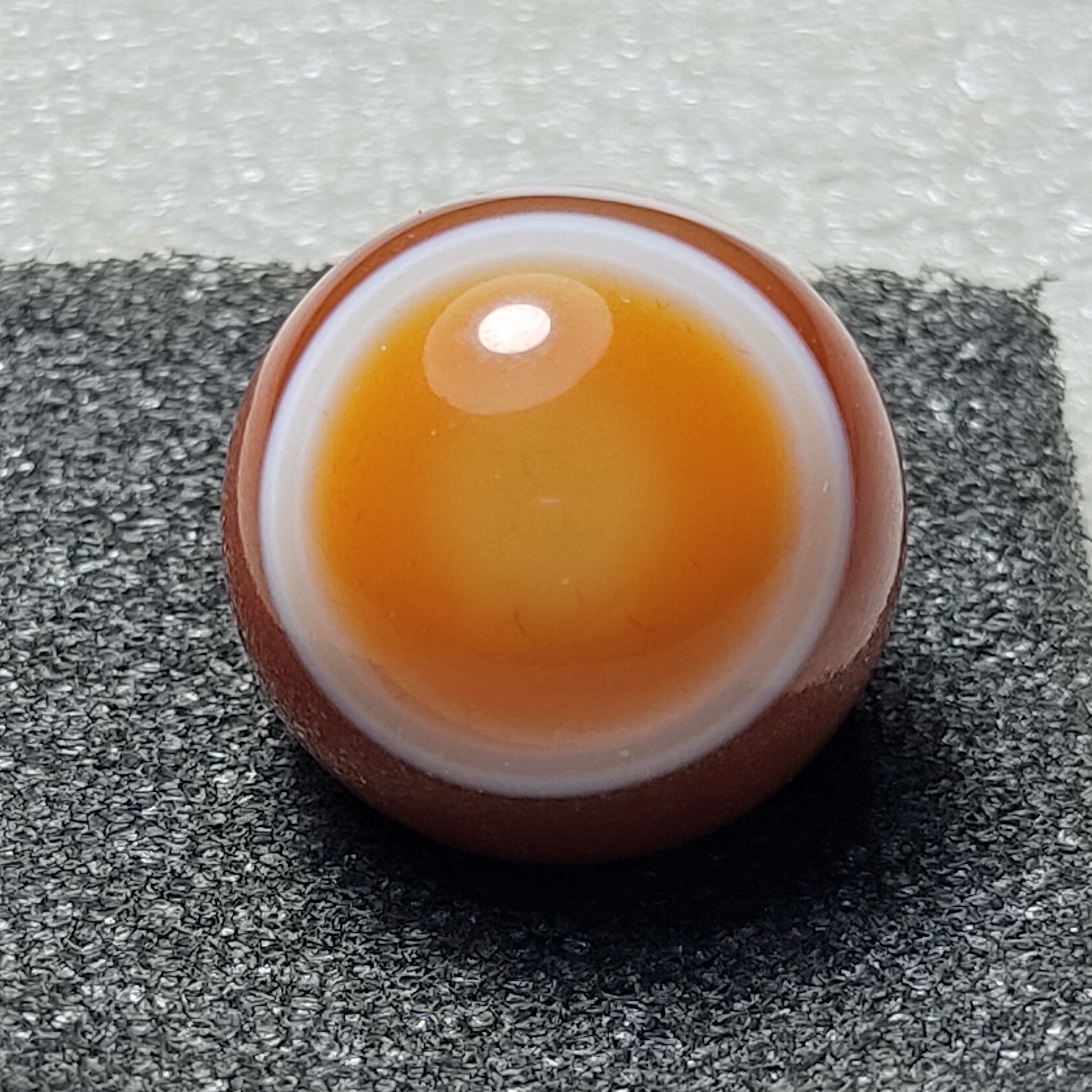 گوی 20 میلیمتری عقیق سرخ باباقوری دوچشم منظم