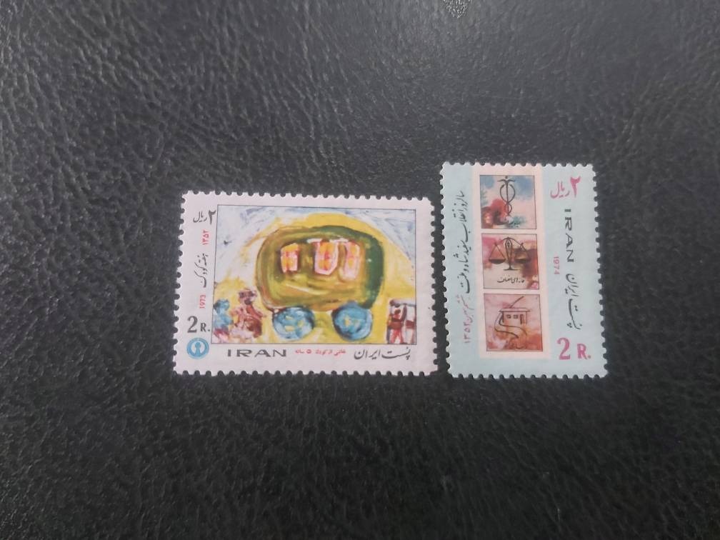 2 عدد تمبر باطل نشده پهلوی کتاب45/000ت