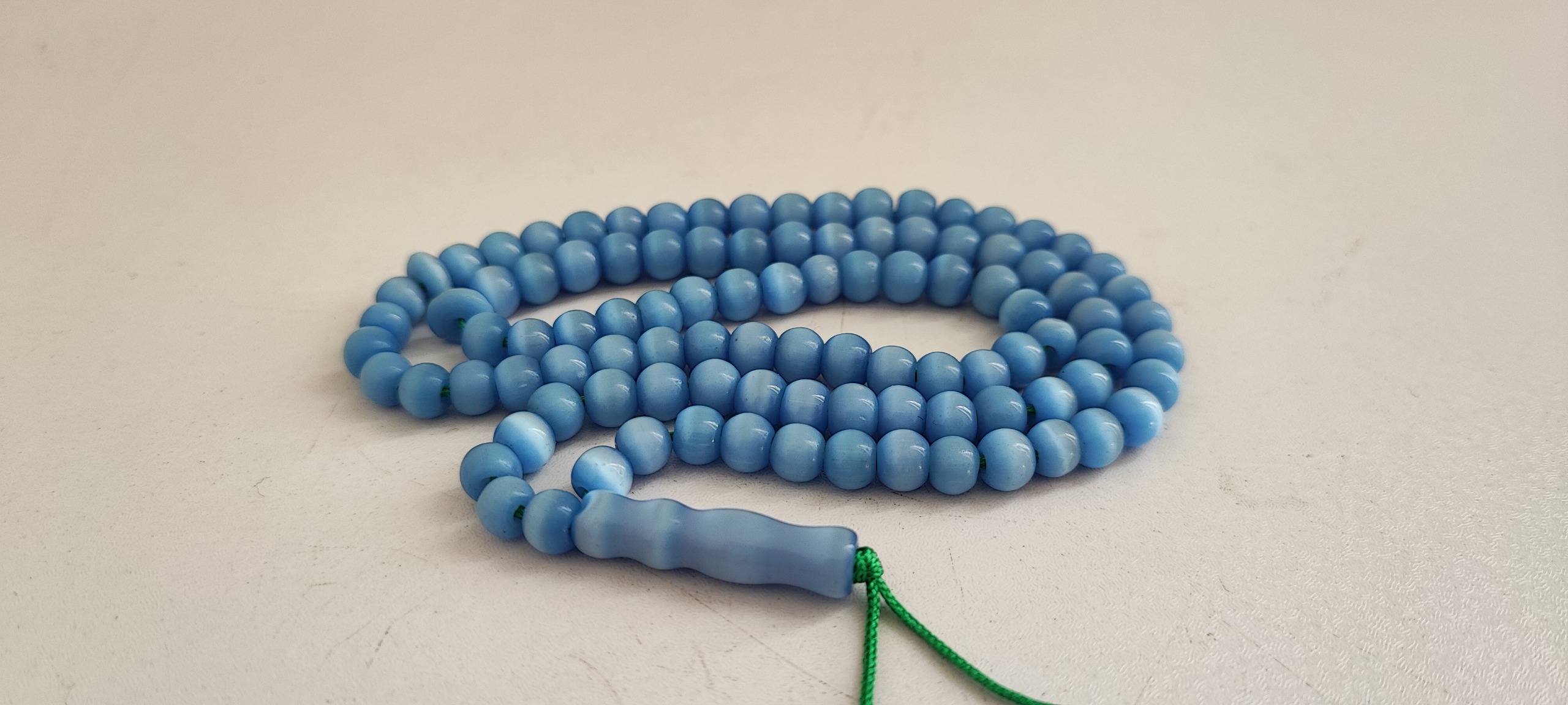 تسبیح چشم گربه کوچک تاجری