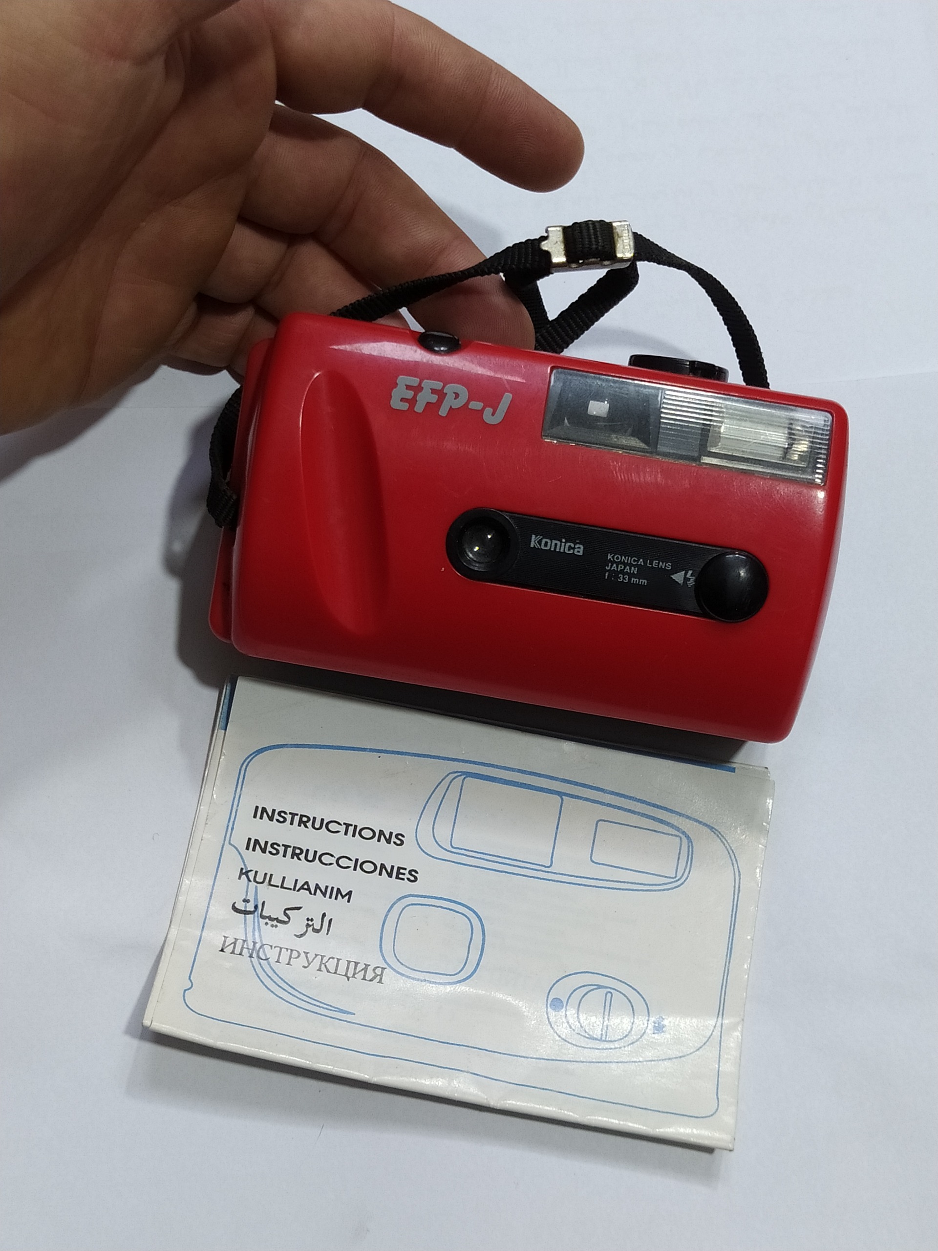 دوربین عکاسی قدیمی konica ژاپنی با دفترچه