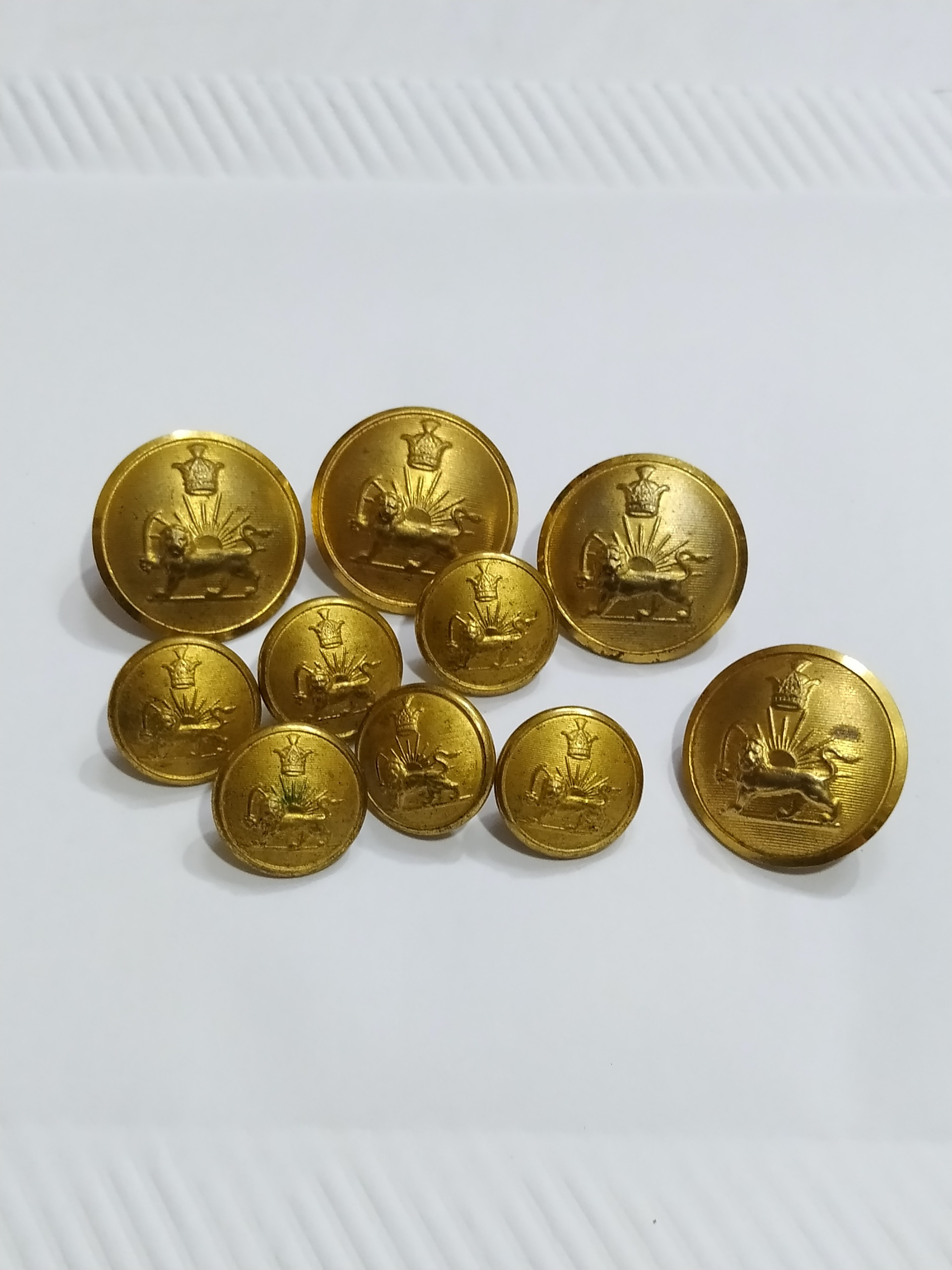 ده عدد دکمه پهلوی قدیمی شیرخورشید اصیل