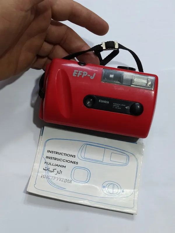 دوربین عکاسی قدیمی konica ژاپنی با دفترچه