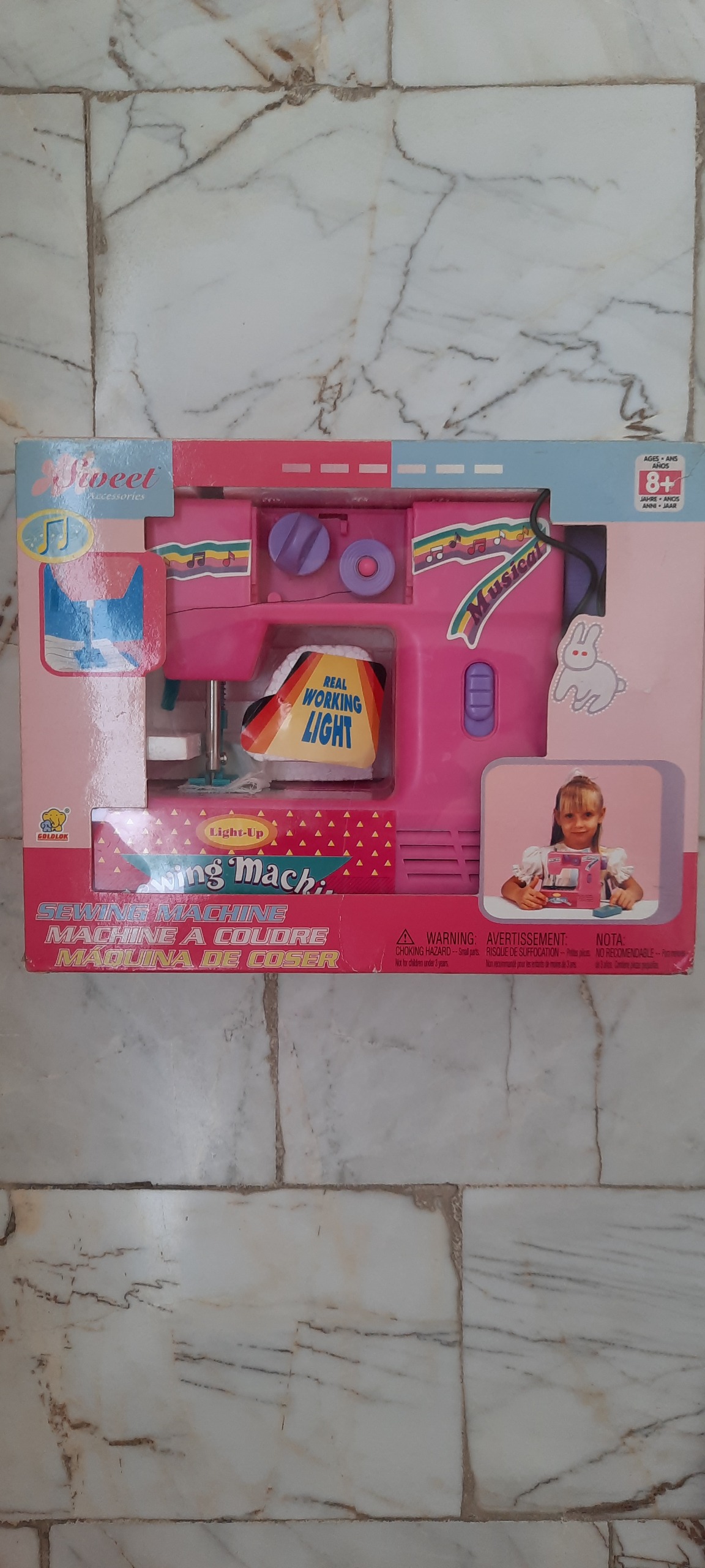 چرخ خیاطی صورتی قابل دوخت و دوز