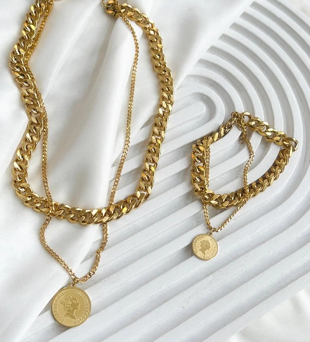 دستبند. و گردنبند دولاین استیل