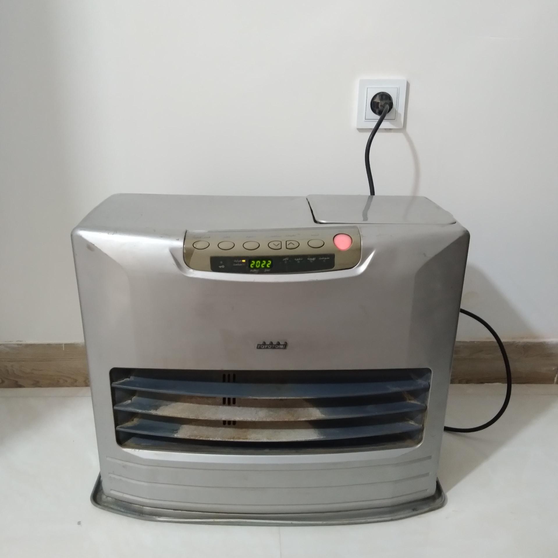 بخاری برقی نفتی