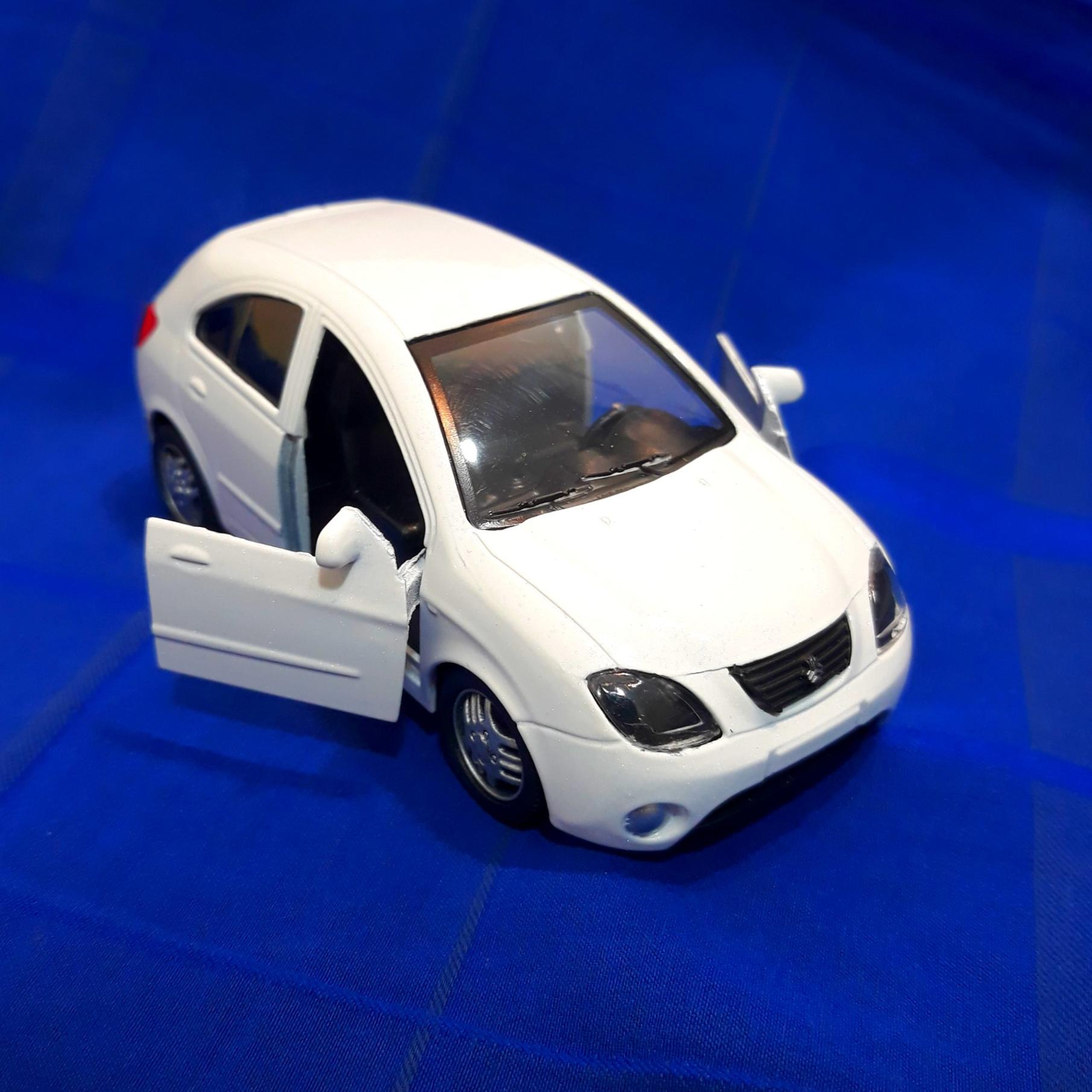 تیبا هاچ بک سفید فلزی