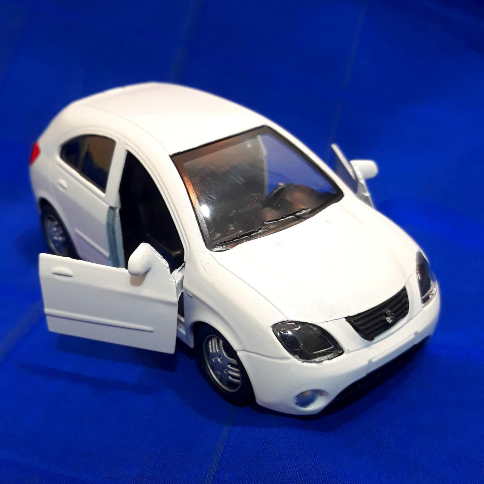 تیبا هاچ بک سفید فلزی