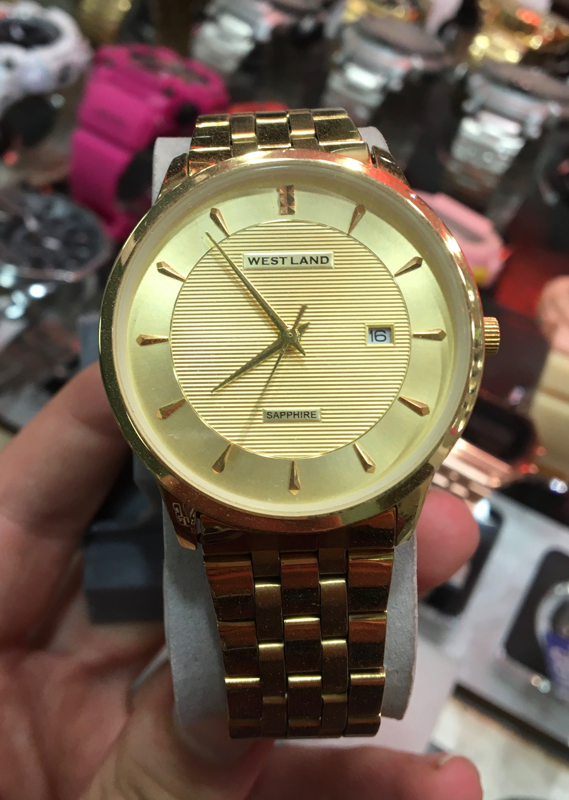 ساعت مچی مردانه برند وست لند صفحه طلایی