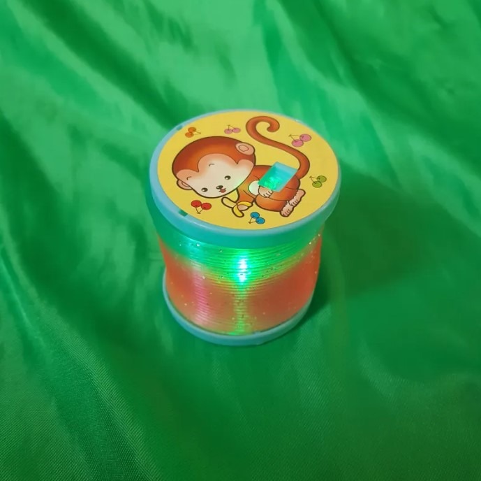 اسباب بازی فنری رقص نور دار